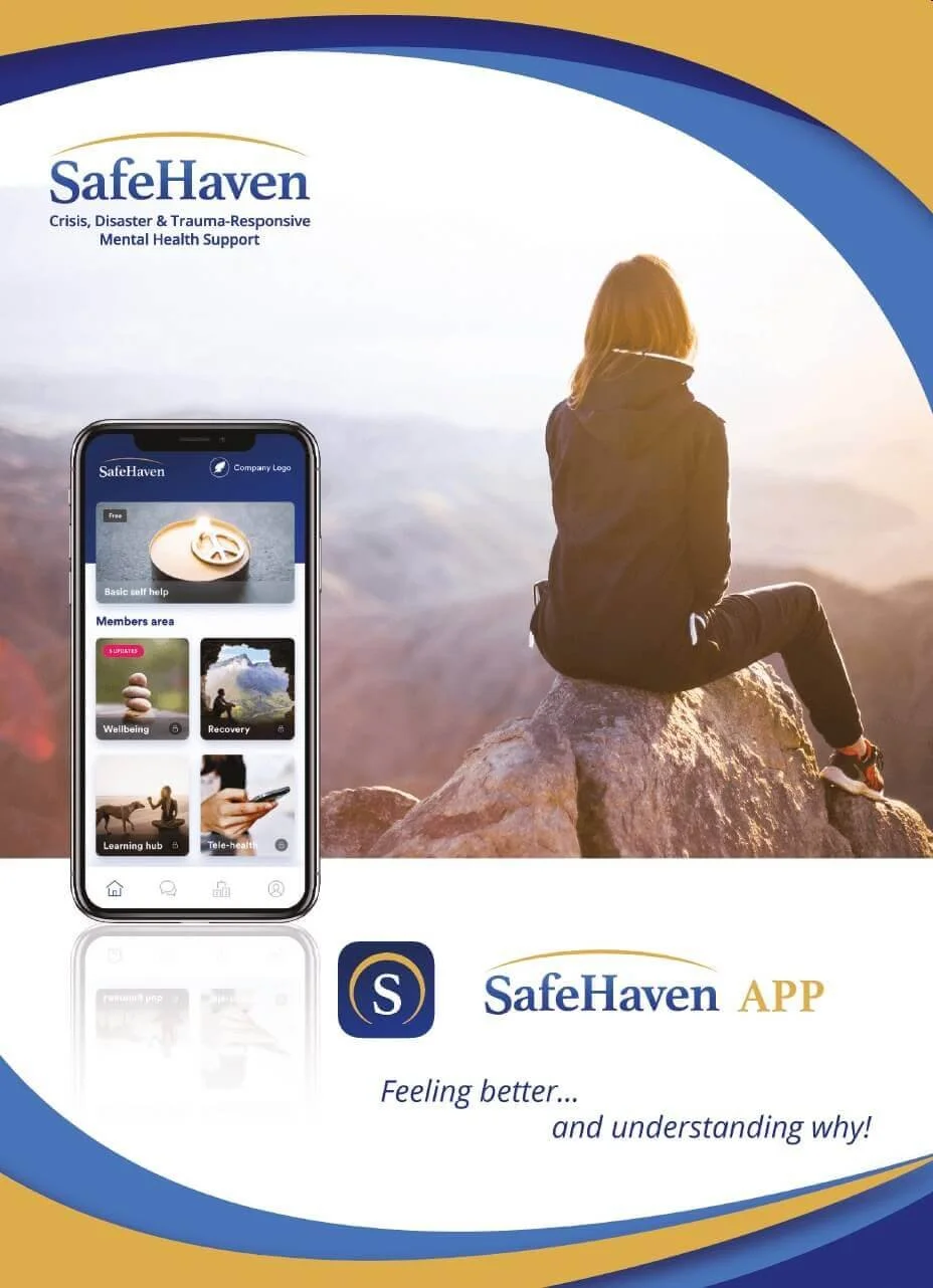 A woman sitting on a rock overlooking a mountain landscape at sunrise, with a smartphone displaying the SafeHaven app on the screen, which offers mental health support and self-help features.