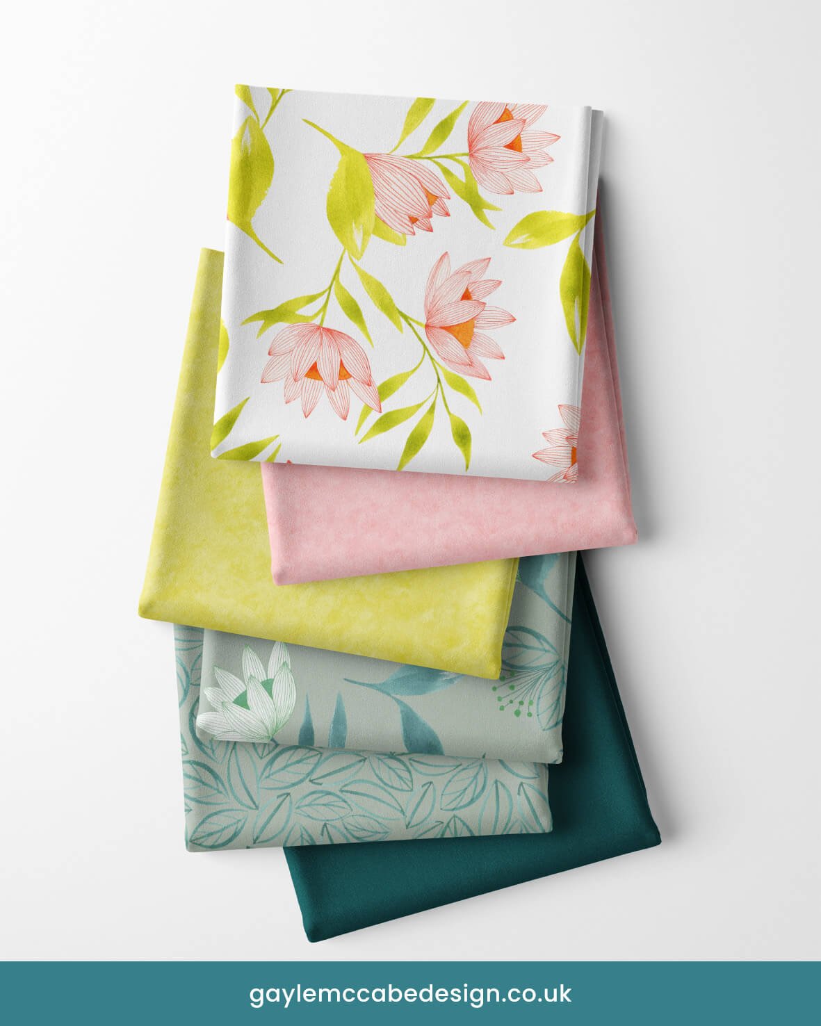 Vibrant pink and lime floral fabric folded in squares