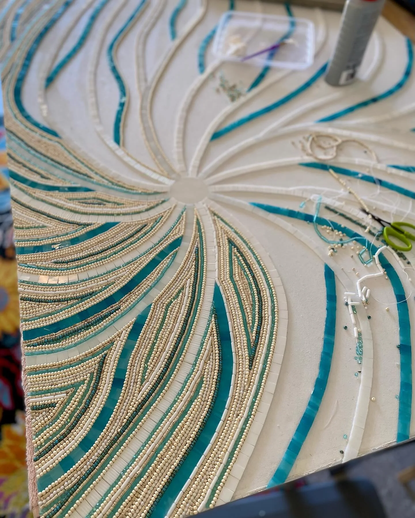 Slowly making progress and having fun on this glass and bead abstract mosaic. Sooo many beads!

#mosaics #mosaicart #glassart #mosaico #mosaique #stainedglassart #beadmosaic #abstractmosaic #contemporaryart #naplesartist