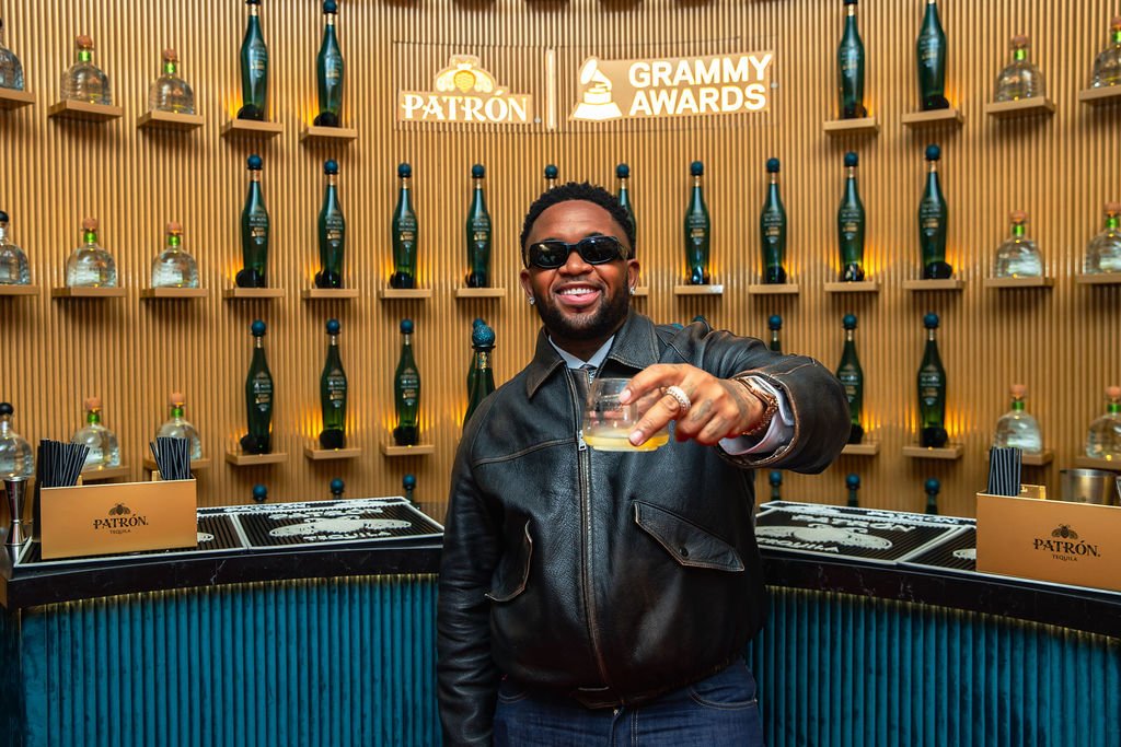 DJ Mustard celebrating his Grammy Award win at the Patrón Tequila Media Center Bar