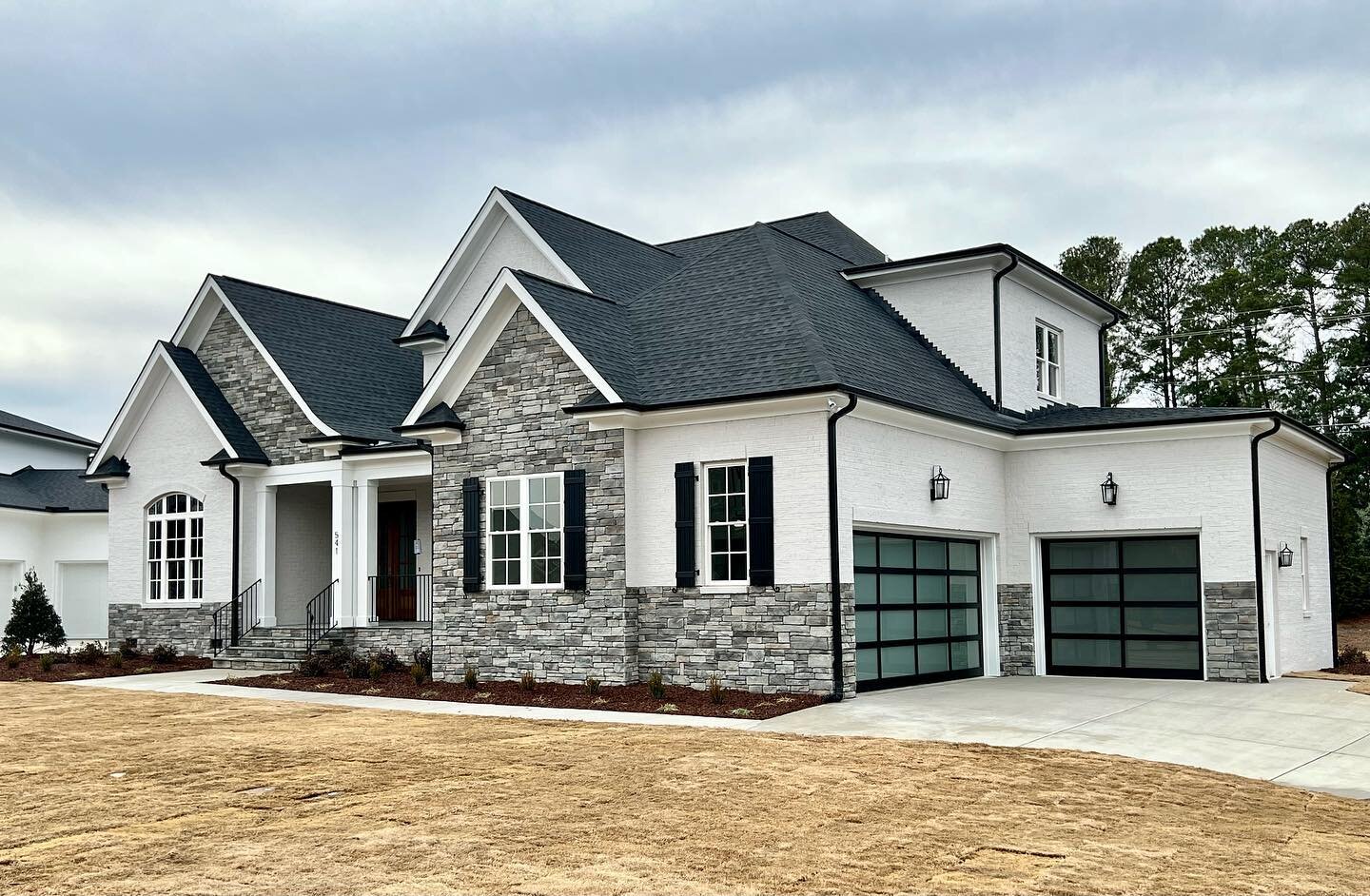 These beautiful glass garage doors added that classy, elegant touch we wanted for this Cary home. 🏡
&nbsp;
Follow us ➡️ @oconnelldeveloping
www.oconnelldeveloping.com

Garage doors- 
@carolinagaragedoorspecialist

#customhome #customhomes #newhome #