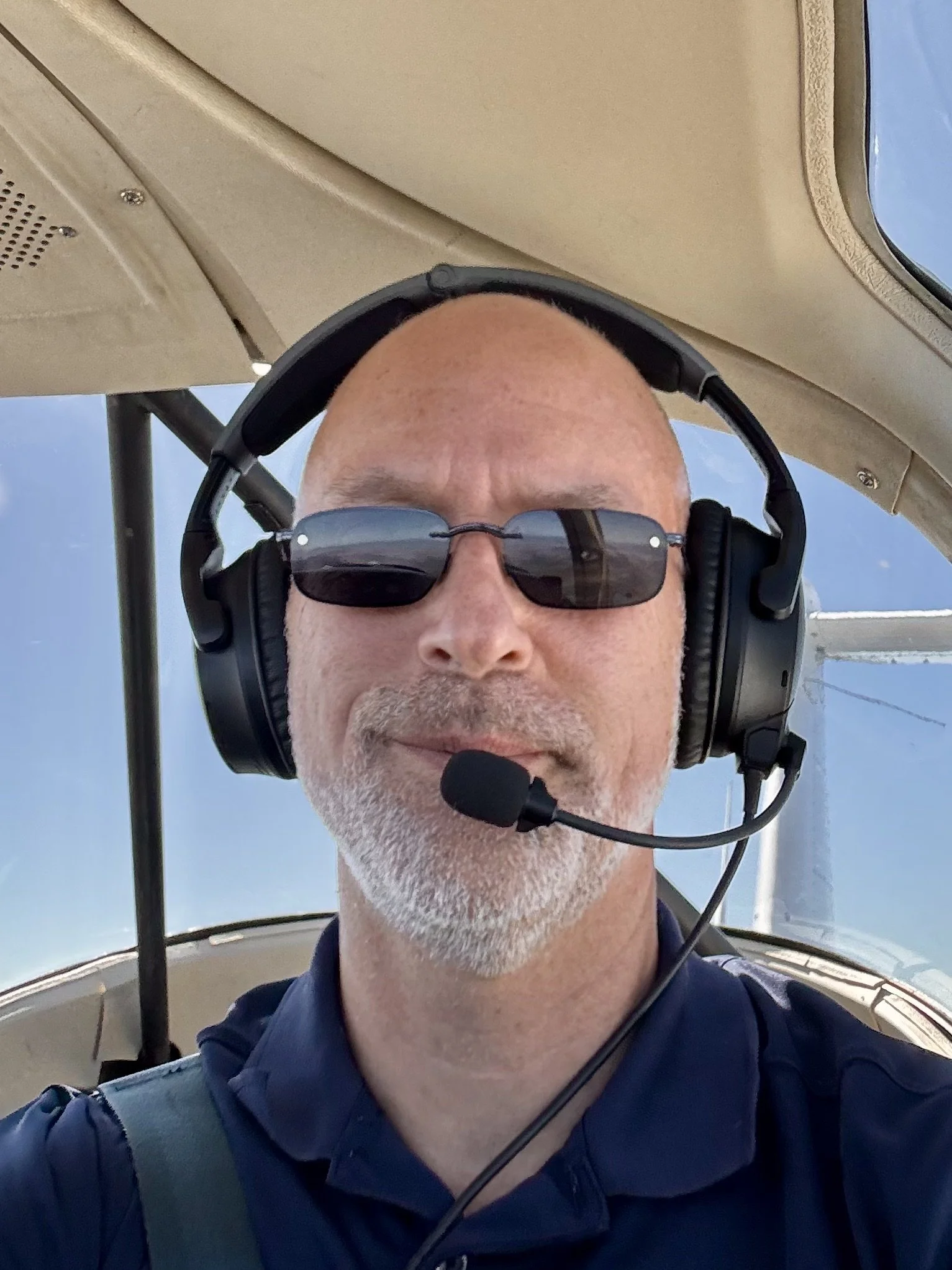 Richard Brong, experienced flight instructor and pilot in the cockpit during a flight.