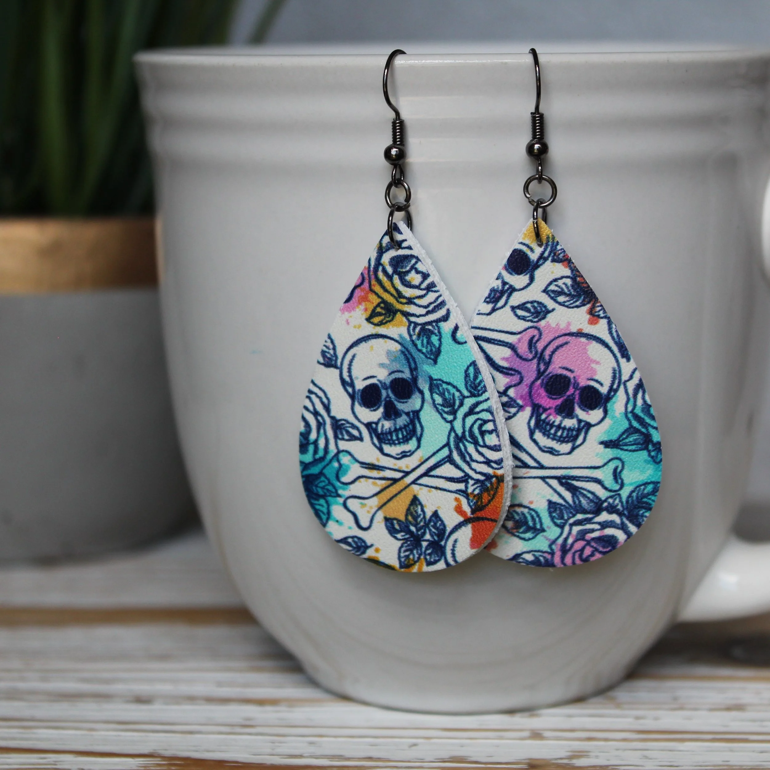 Throwback Feminine Skulls Faux Leather Teardrop