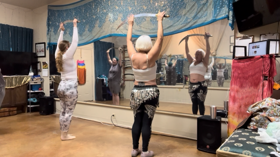 Sword Foundations students practicing in the studio