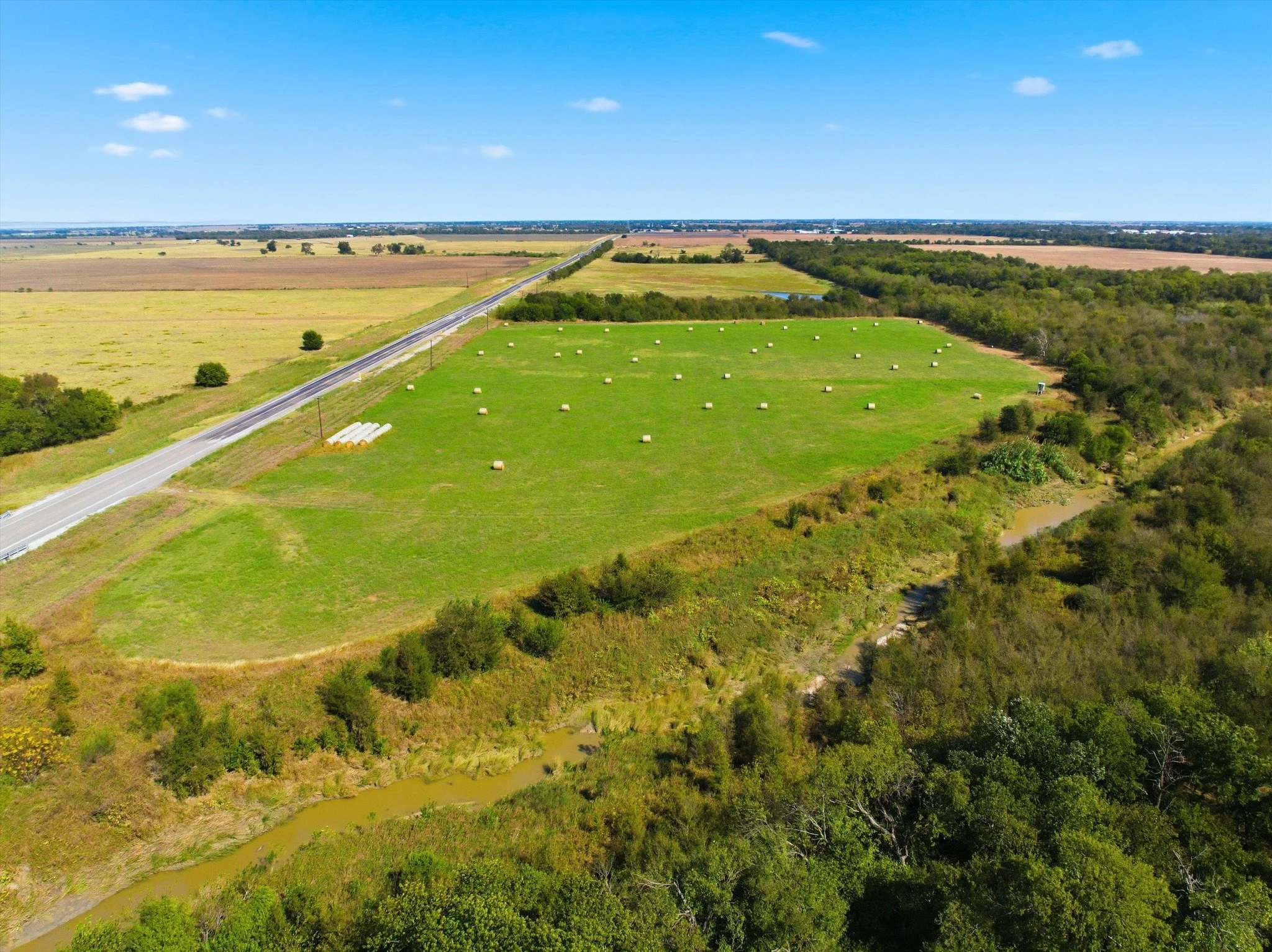Thinking about owning the perfect place that can be dual purpose? This beautiful hay meadow can produce you income, feed your livestock and makes a great reactional hunting site! Located right outside of Rosebud on Hwy 53 this 23 acre MOL property is