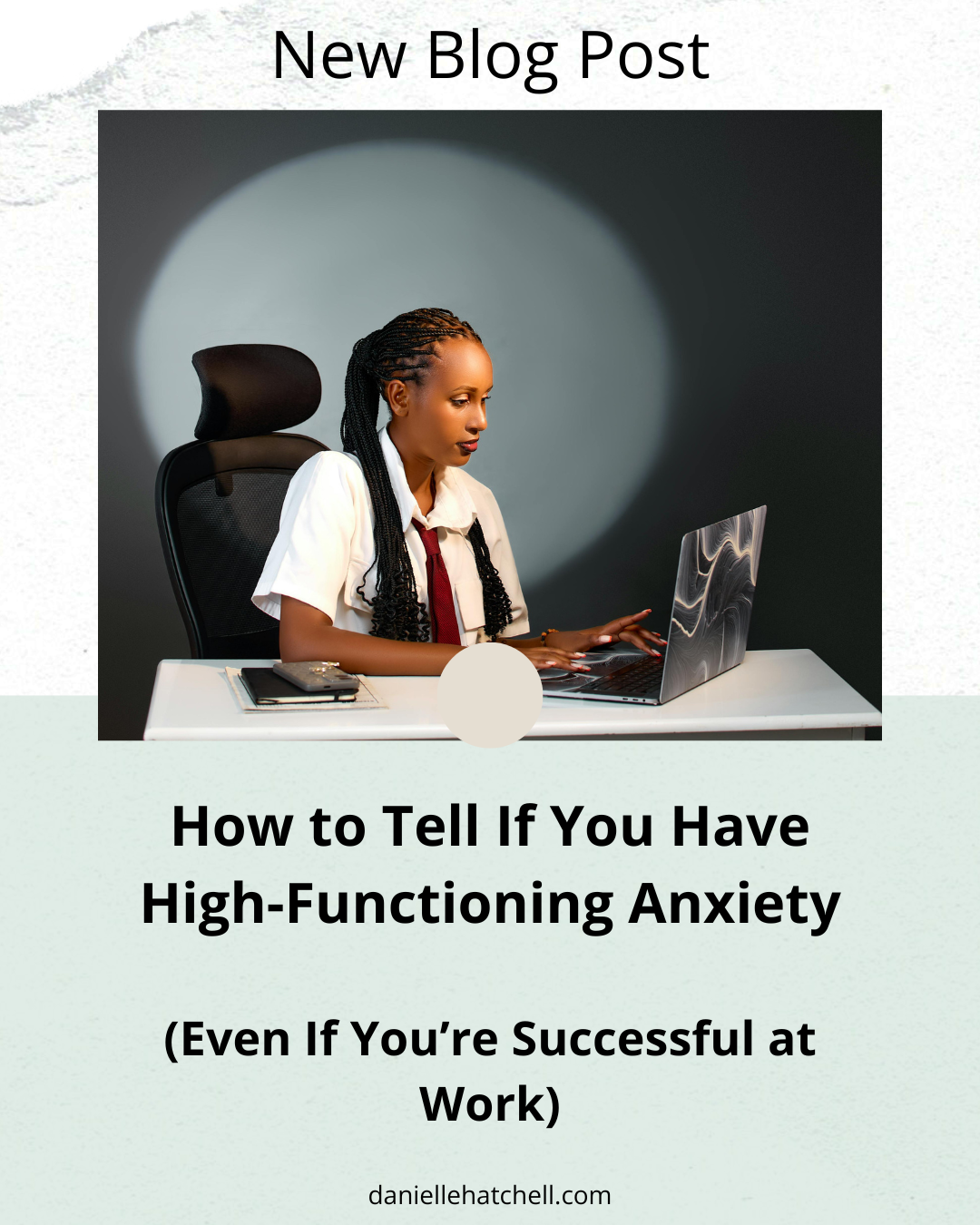 Woman sitting at a work desk on a computer. Danielle Hatchell, LCPC offers anxiety therapy Maryland for high-functioning anxious professionals.