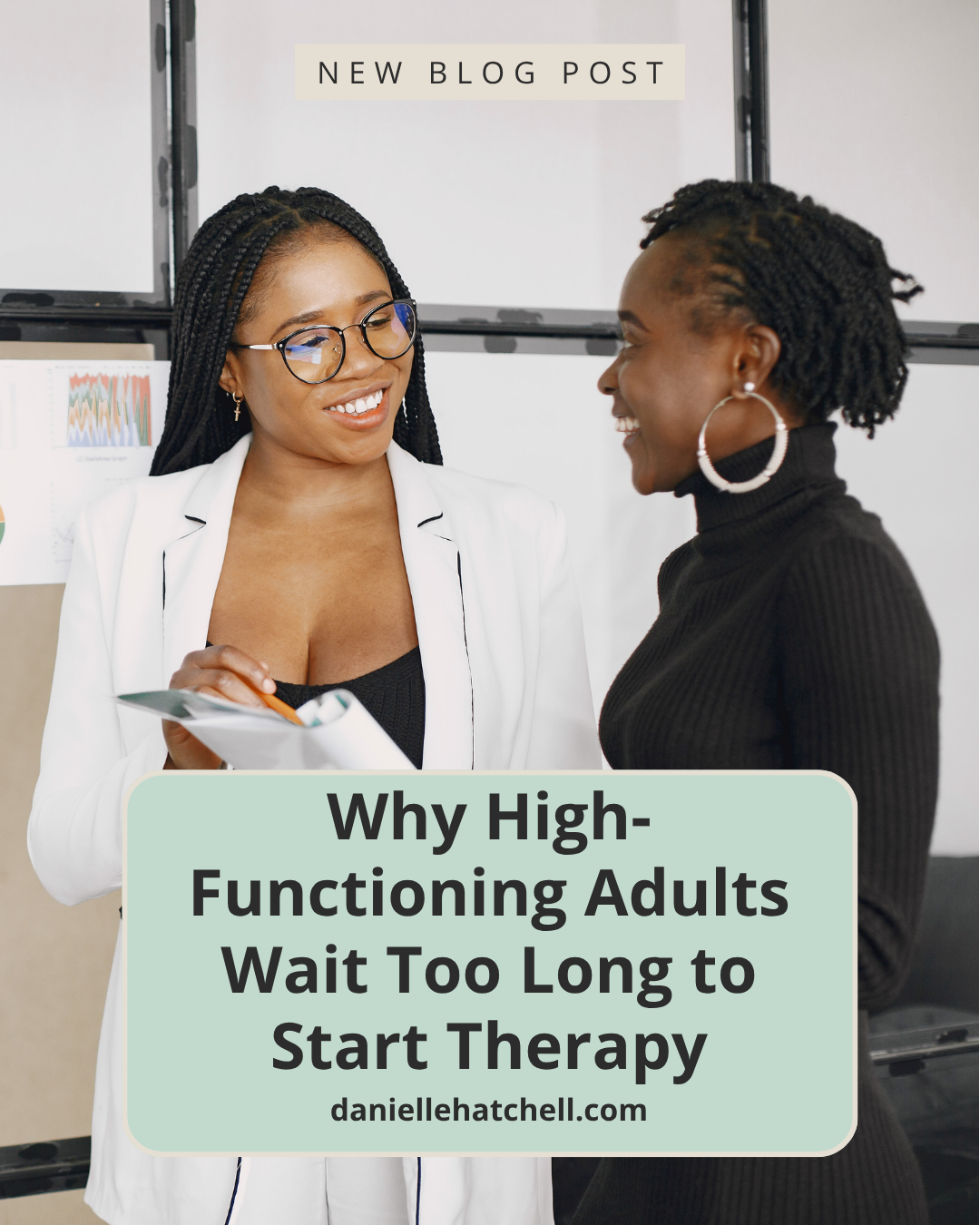 Two female coworkers talking and smiling. Danielle Hatchell, LCPC offers Anxiety Therapy Maryland to high-functioning anxious adults