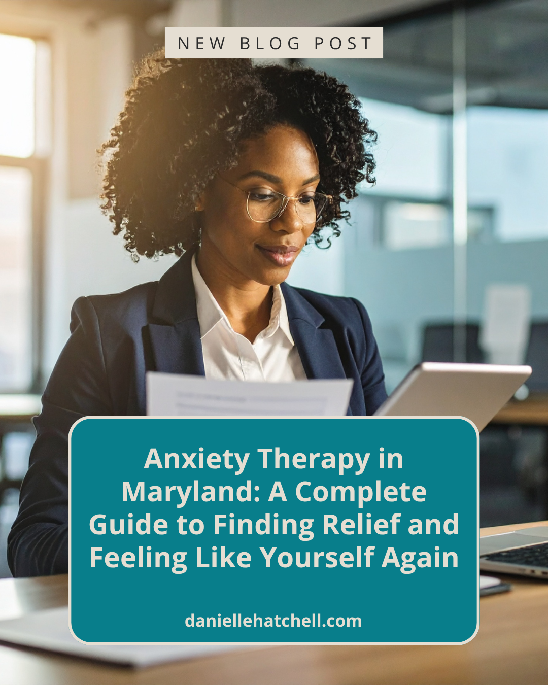 A woman of color working in a professional environment and looking calm. Danielle Hatchell, LCPC provides anxiety therapy Maryland for high-functioning anxious professionals.