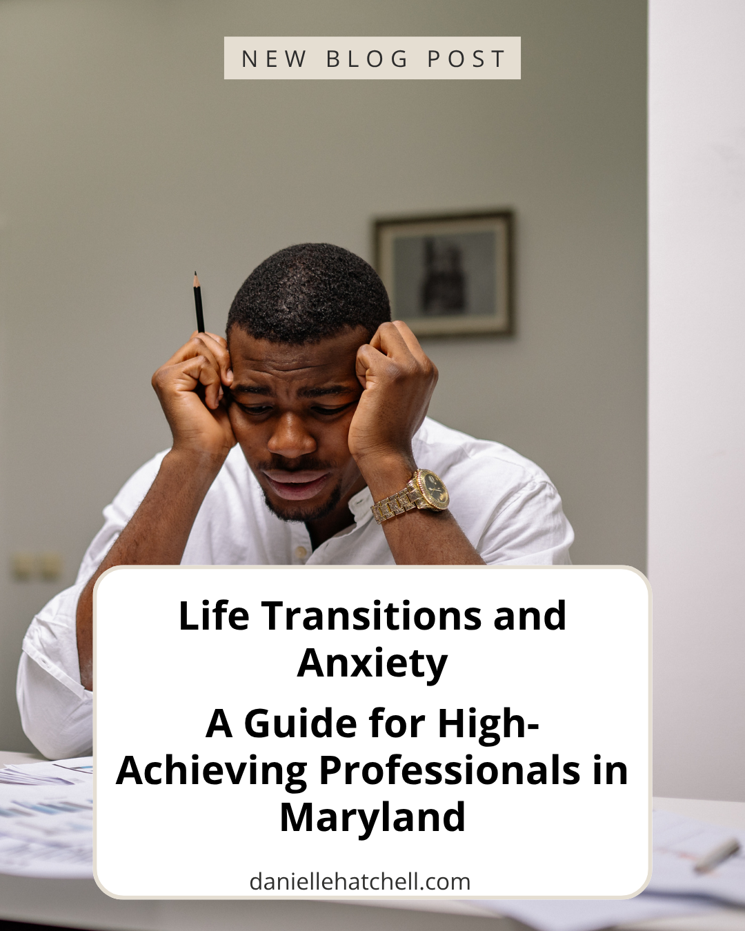 Man sitting at his desk with his hands holding his face. Danielle Hatchell, LCPC offers Anxiety Therapy Maryland