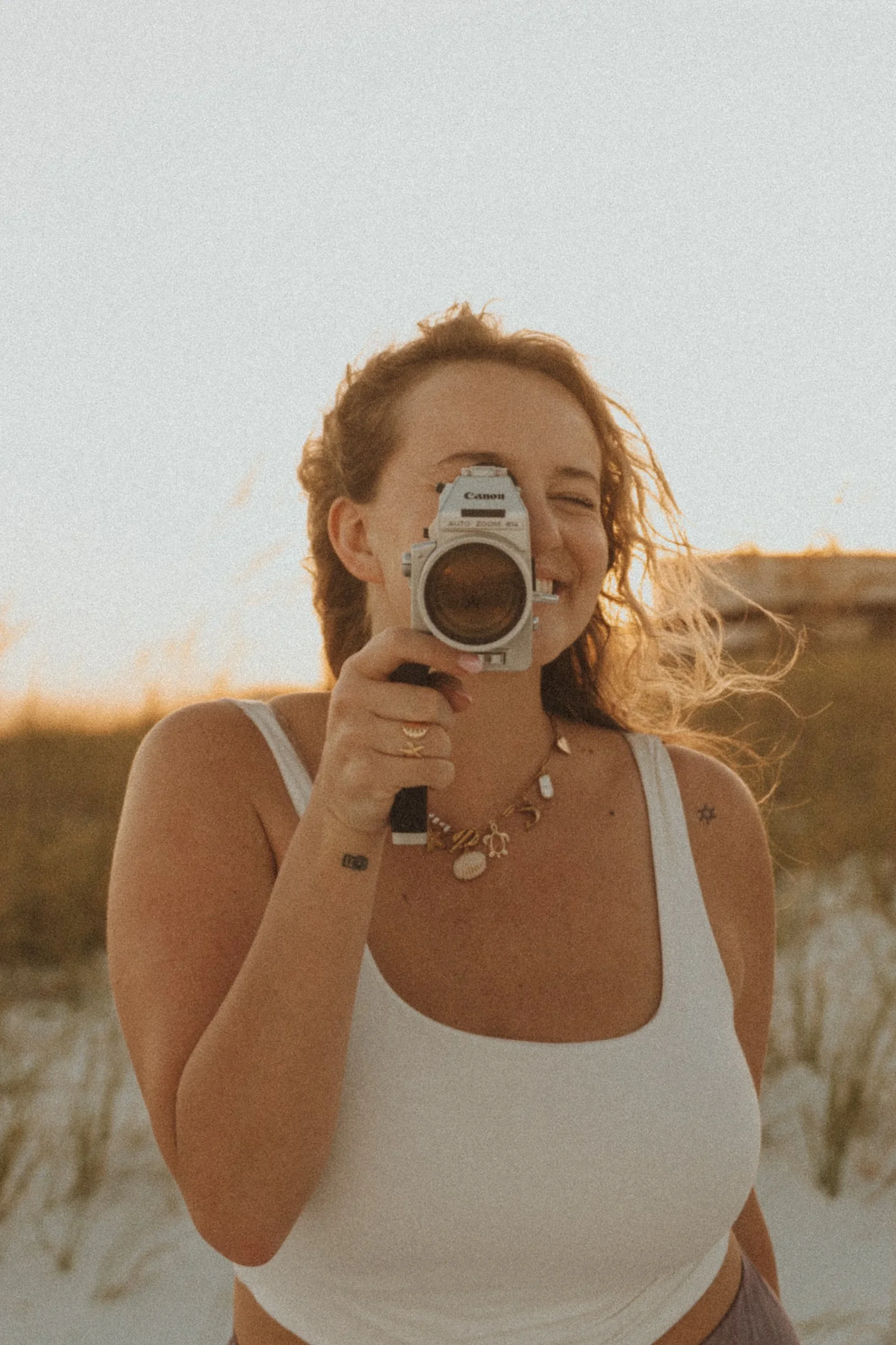 Destin Photo and Film Photogarpher with super 8 camera