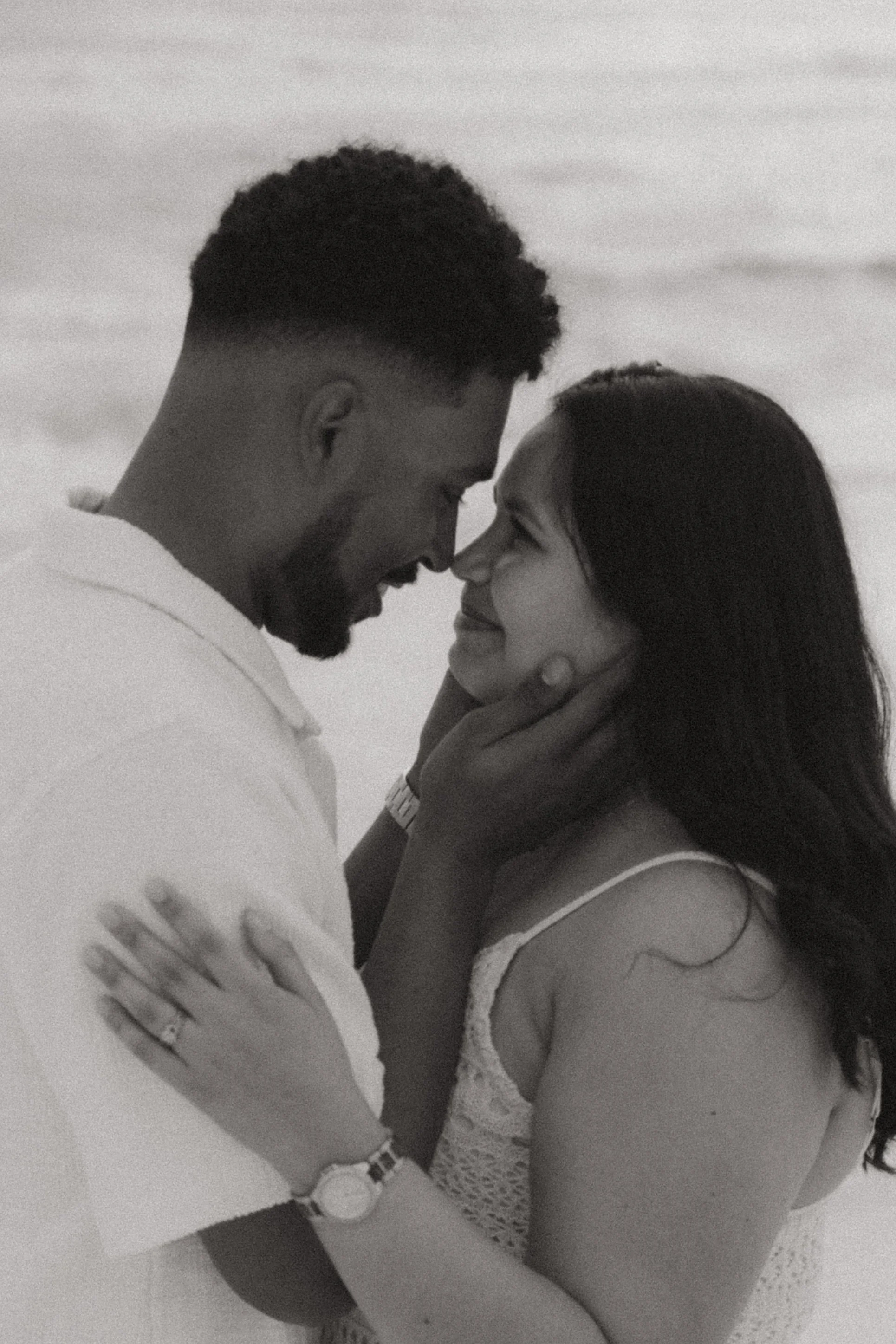 Engagement portrait session of couple close together