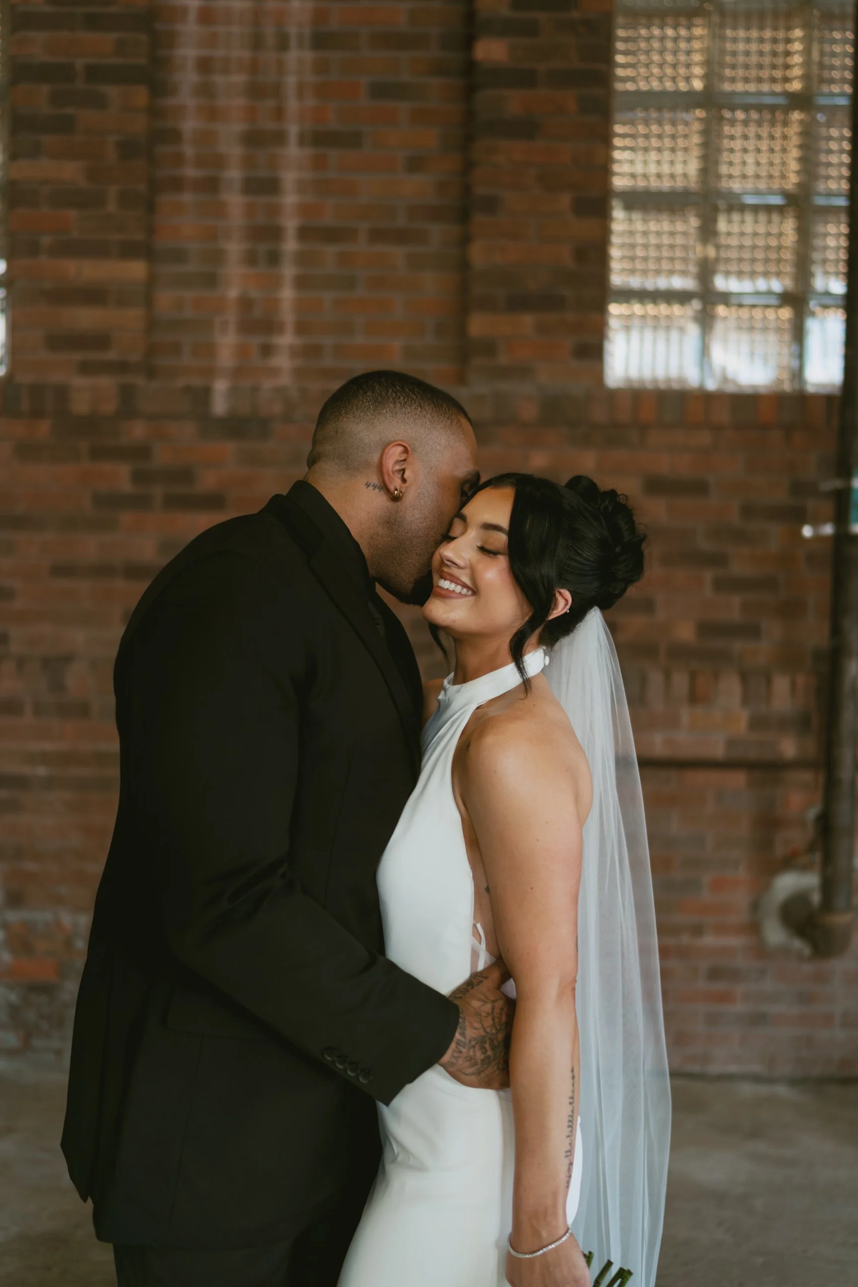 Bride and Groom stealing a moment during their classic wedding
