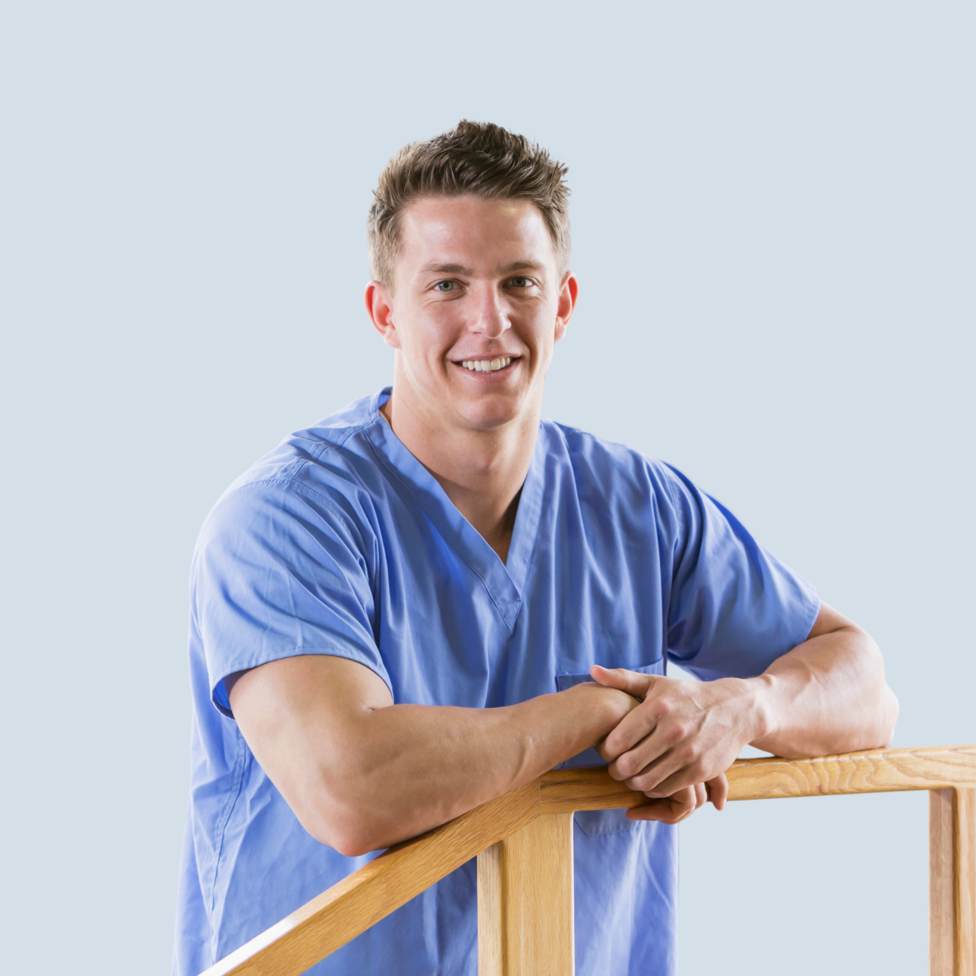 Physical therapist working with a senior resident during a treatment session