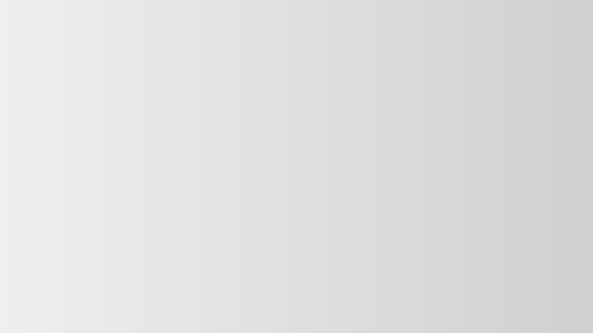 Empty gray gradient background with no objects or text.