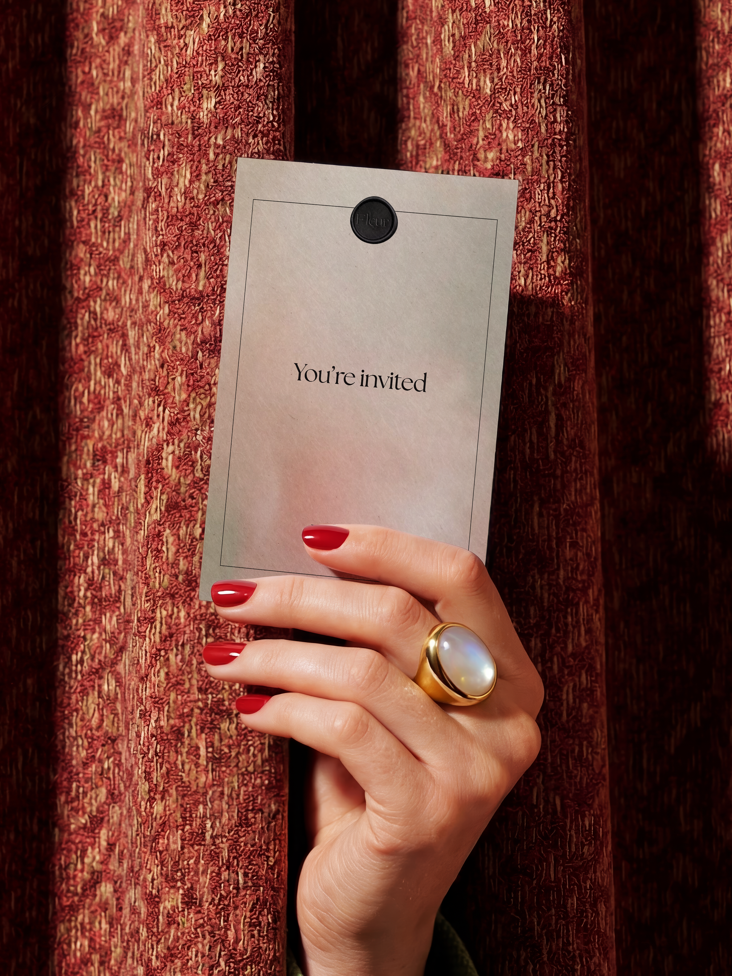 business-card-mockup-in-hand-from-behind-a-curtain-front-view.png