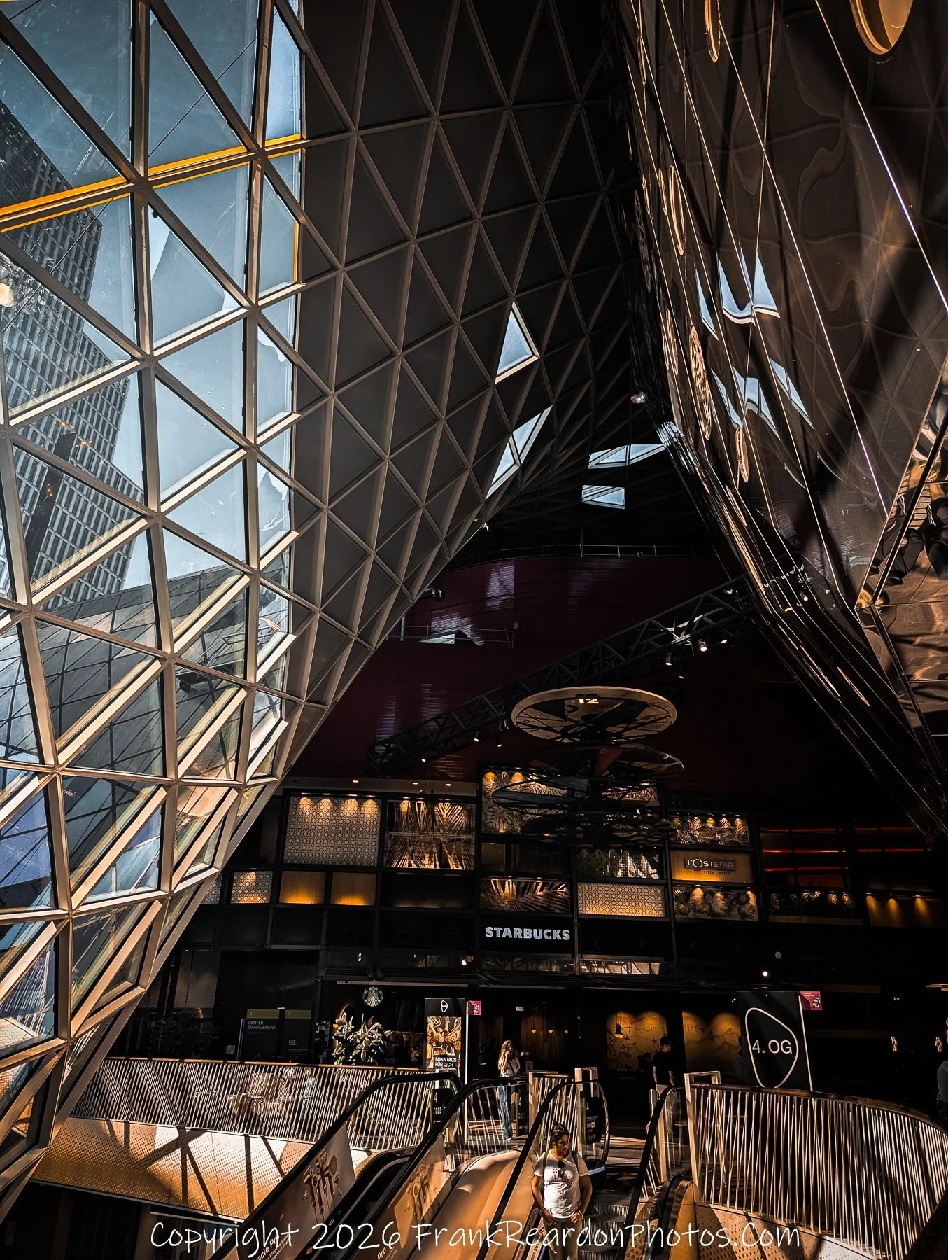 MyZeil Interior – Escalator and Glass Facade (Lower Level View)
“Between Steel and Sky – MyZeil Interior Perspective”