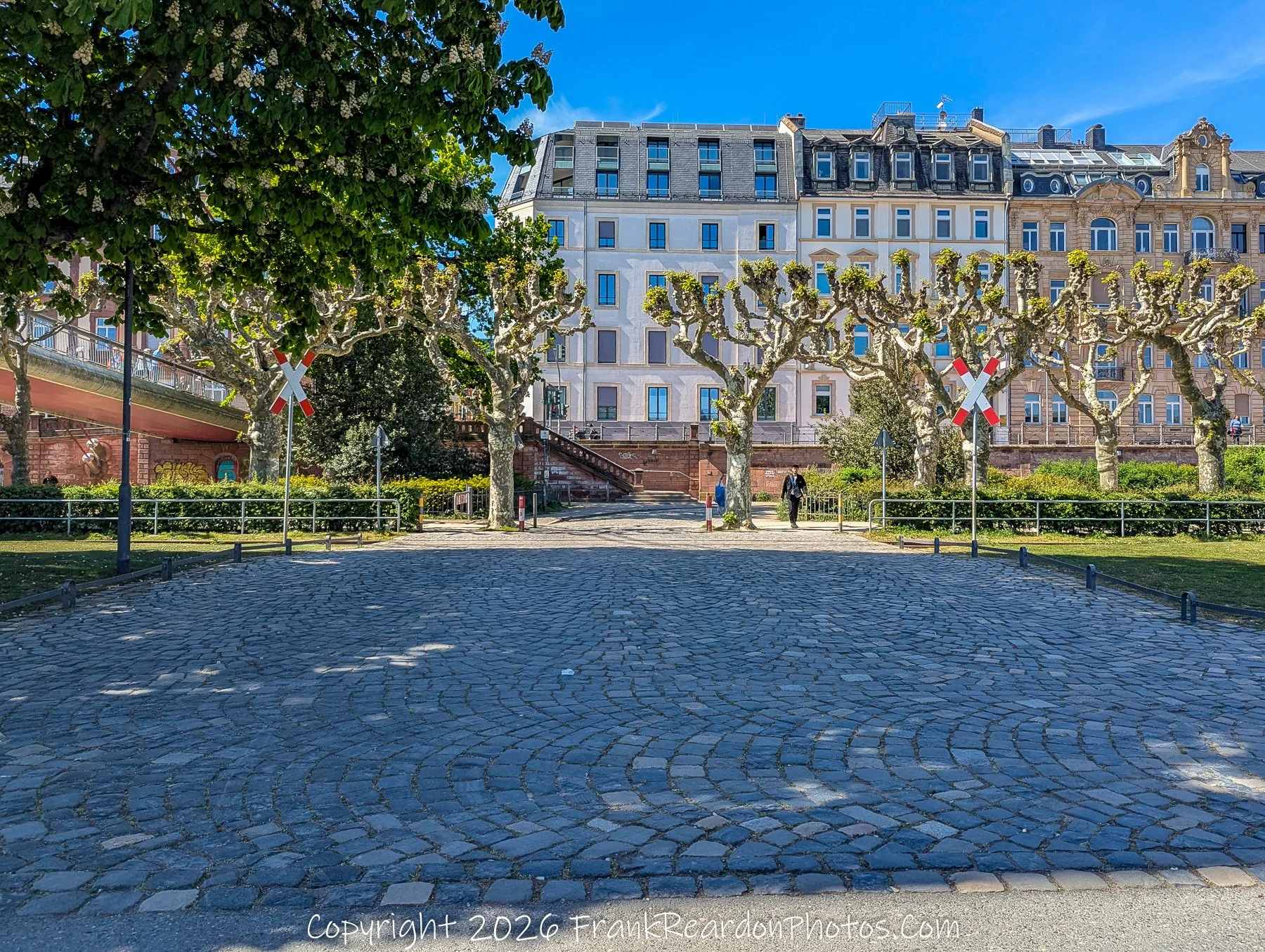 Tree-Lined Square with Historic Buildings
“Framed by Trees – A Frankfurt Courtyard”