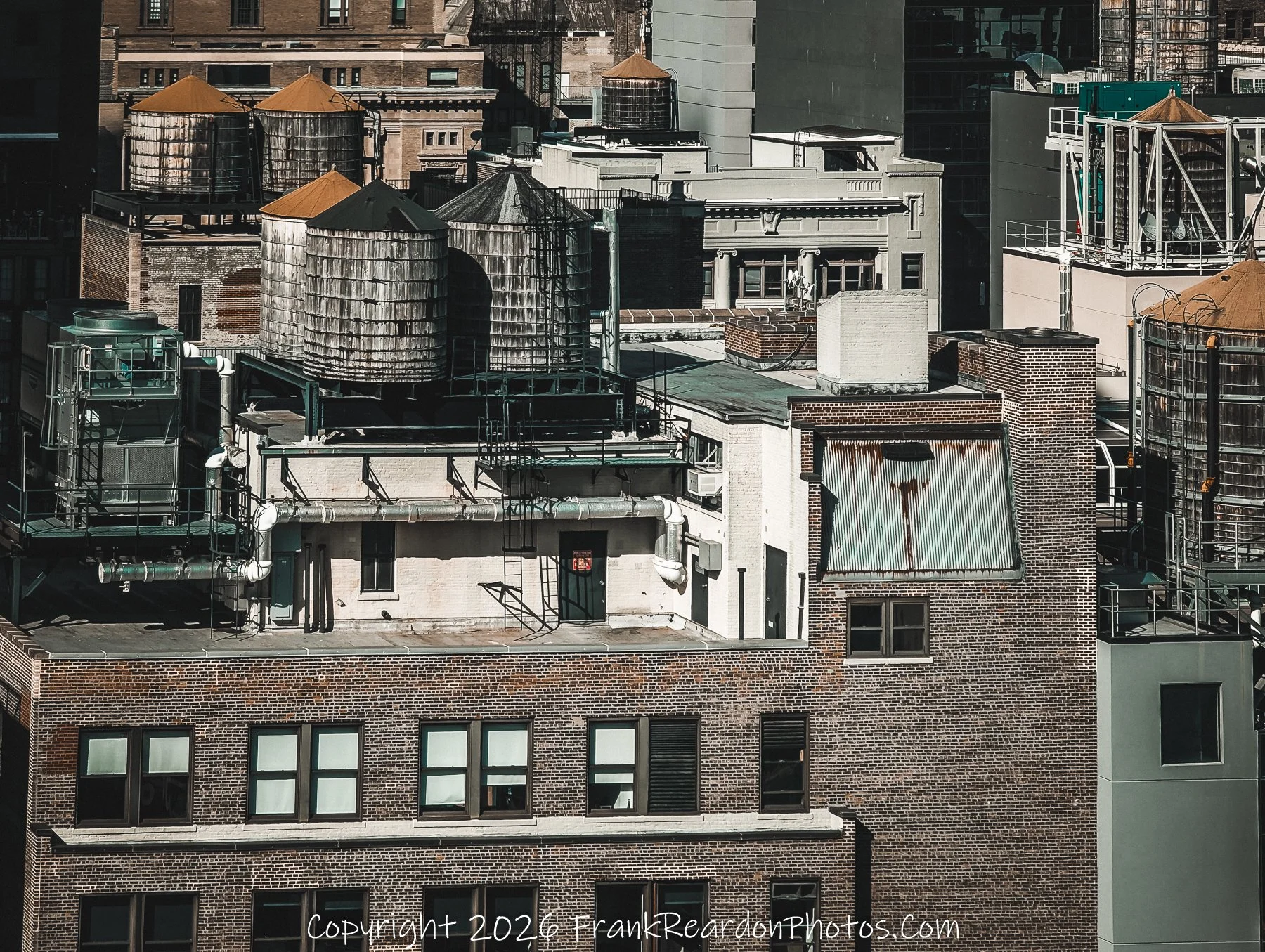 “Rooftop Tanks and Urban Geometry”