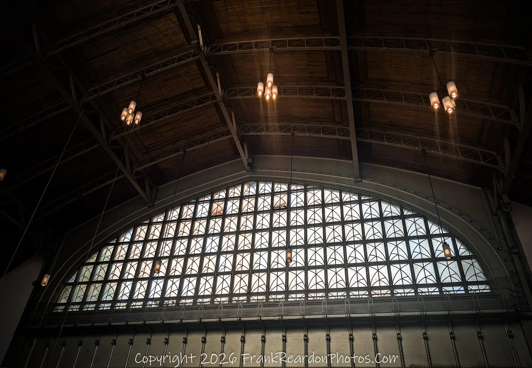 “Light and Lattice” The station’s grand window filters daylight into geometric poetry.