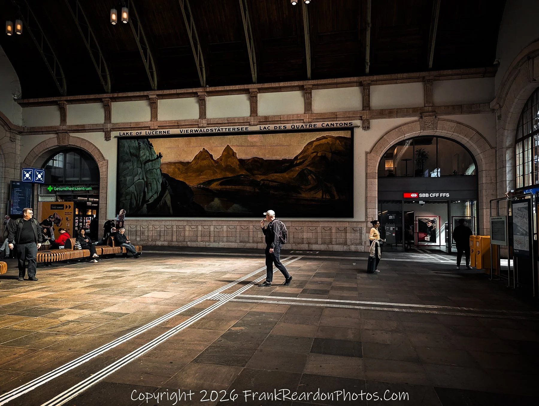“Echoes of Lucerne” Inside Basel SBB, a mural of mountains reminds travelers of Switzerland’s serene soul.