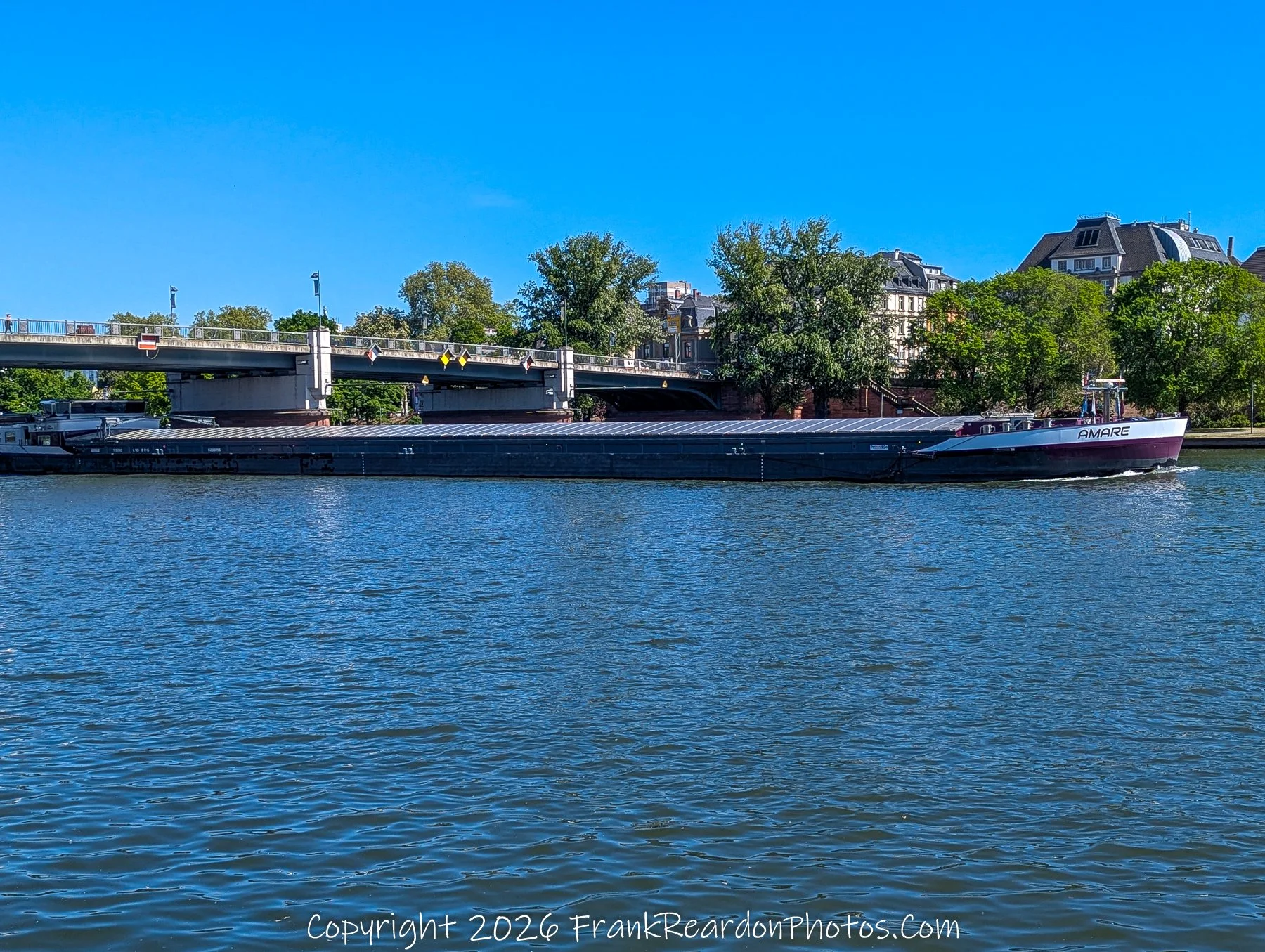 Cargo Ship on the Main River (AMARE)
“Cargo on the Main – Frankfurt in Motion”