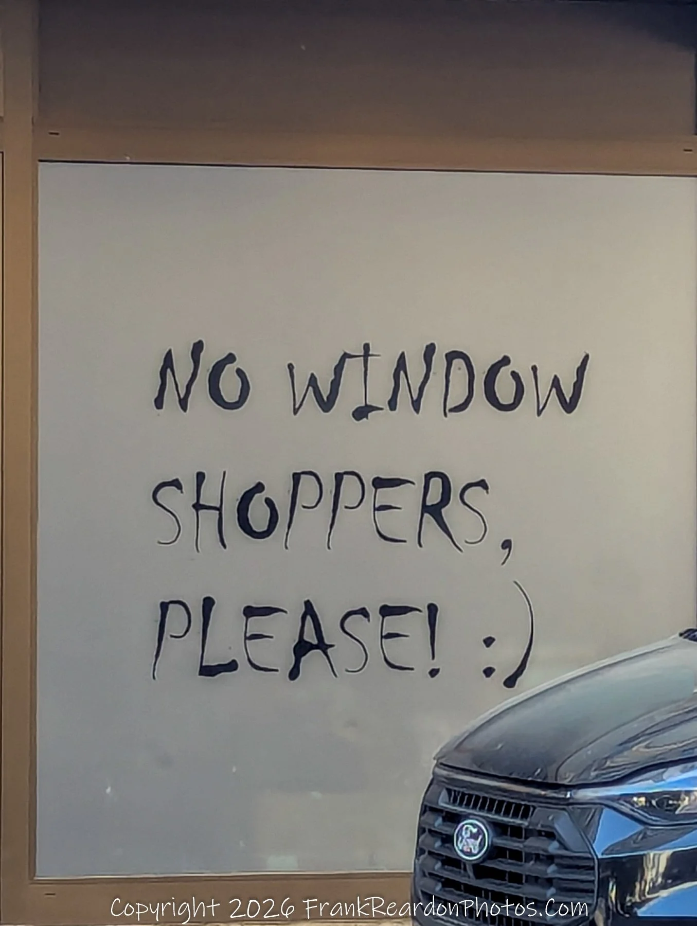 No Window Shoppers
Humorous urban capture "NO WINDOW SHOPPERS, PLEASE! :)"