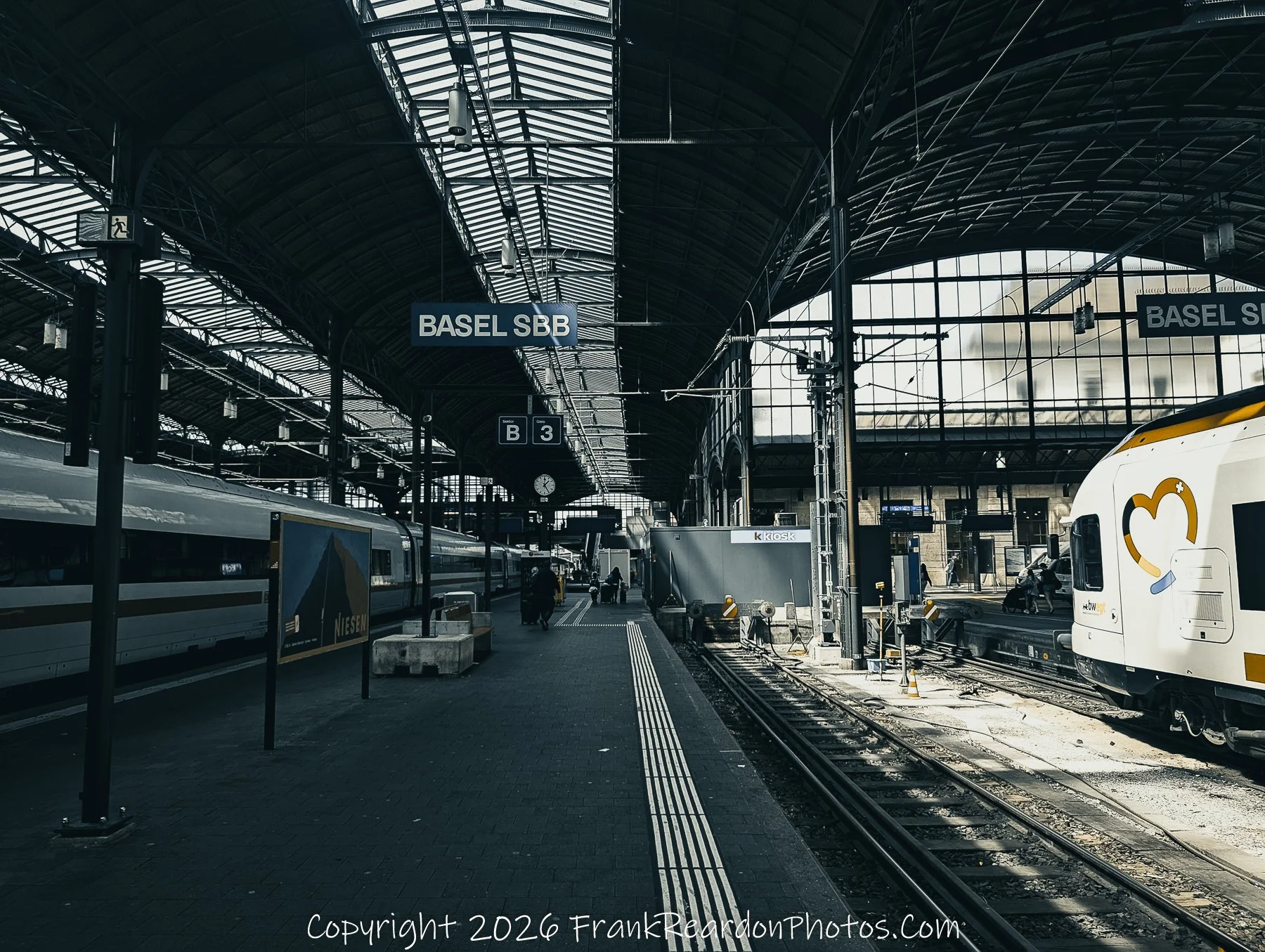 “Tracks of Transition” Basel SBB’s platforms echo the pulse of journeys beginning and ending under its glass canopy.