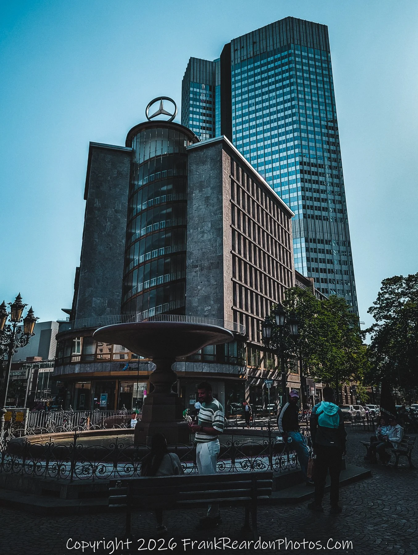 Modern Skyline with Mercedes-Benz Tower and Fountain (Frankfurt)
“Urban Layers – Fountain and Skyline in Frankfurt”