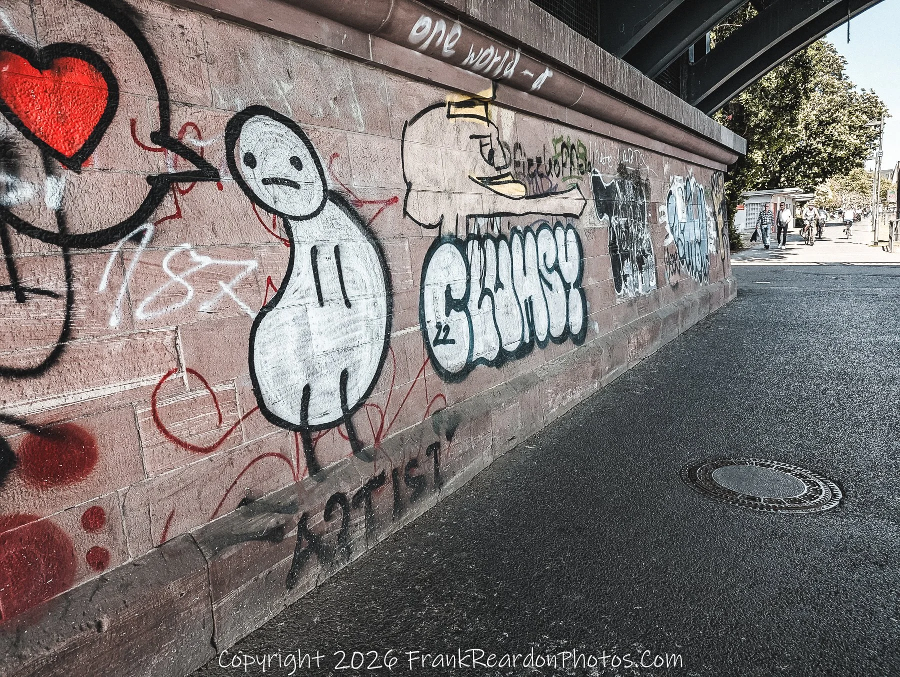Graffiti Wall Under Bridge
“Urban Expression – Voices Beneath the Bridge”
