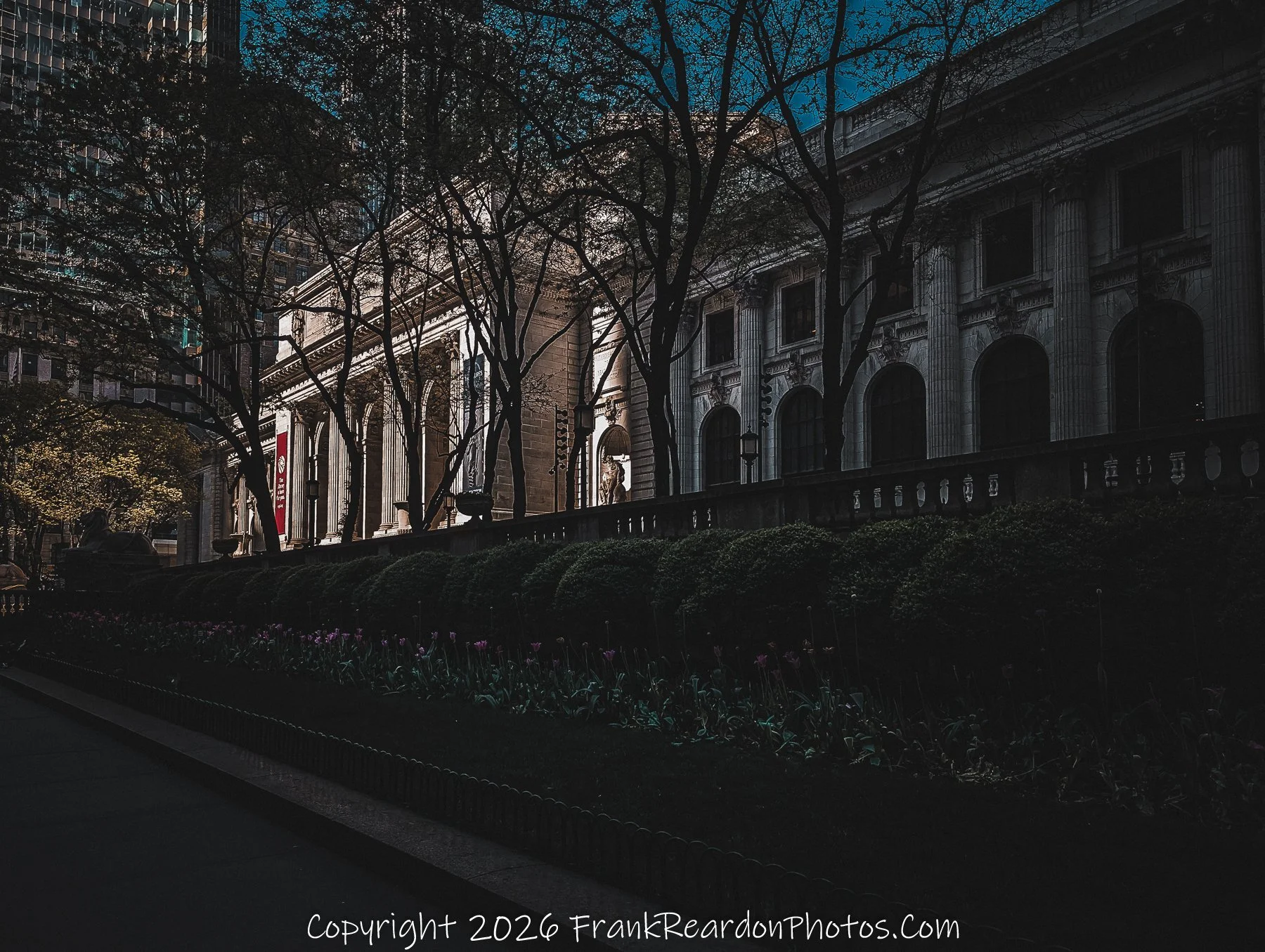 “Bryant Park Edge: Shadows and Stone”