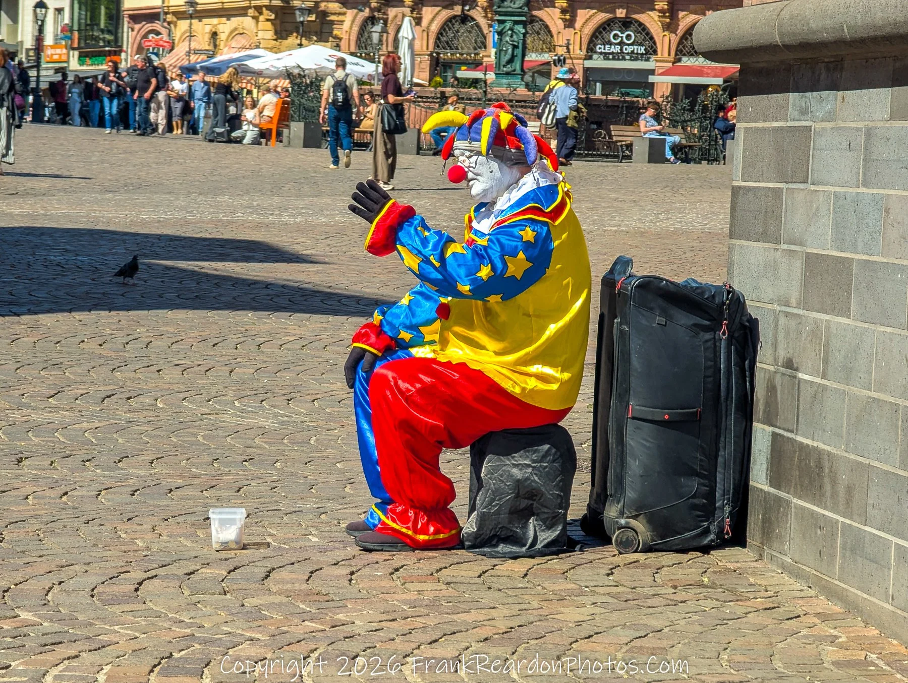 Street Performer (Clown) in Public Square
“Street Performance – Colour in the Square”