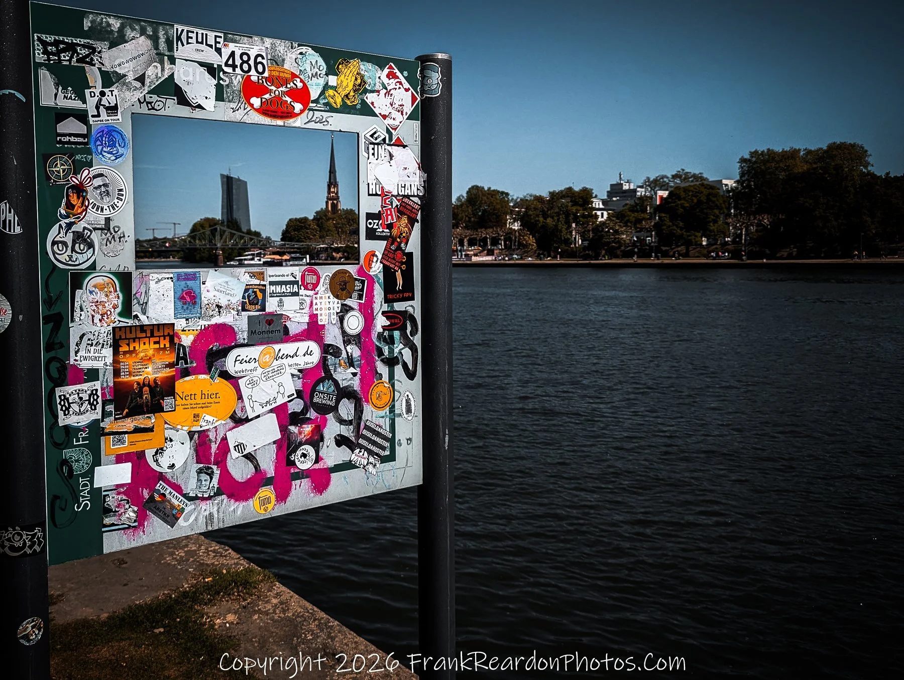 Sticker-Covered Frame with Skyline and Church Spire
“Framed Frankfurt — Stickers and Skyline”