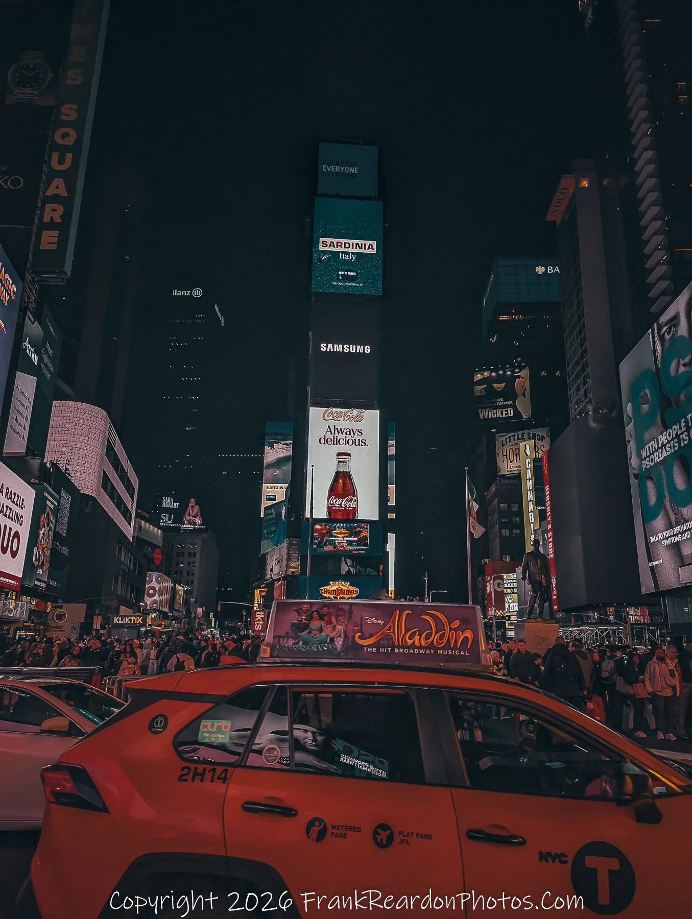 "Taxi and Towers: Times Square After Dark”