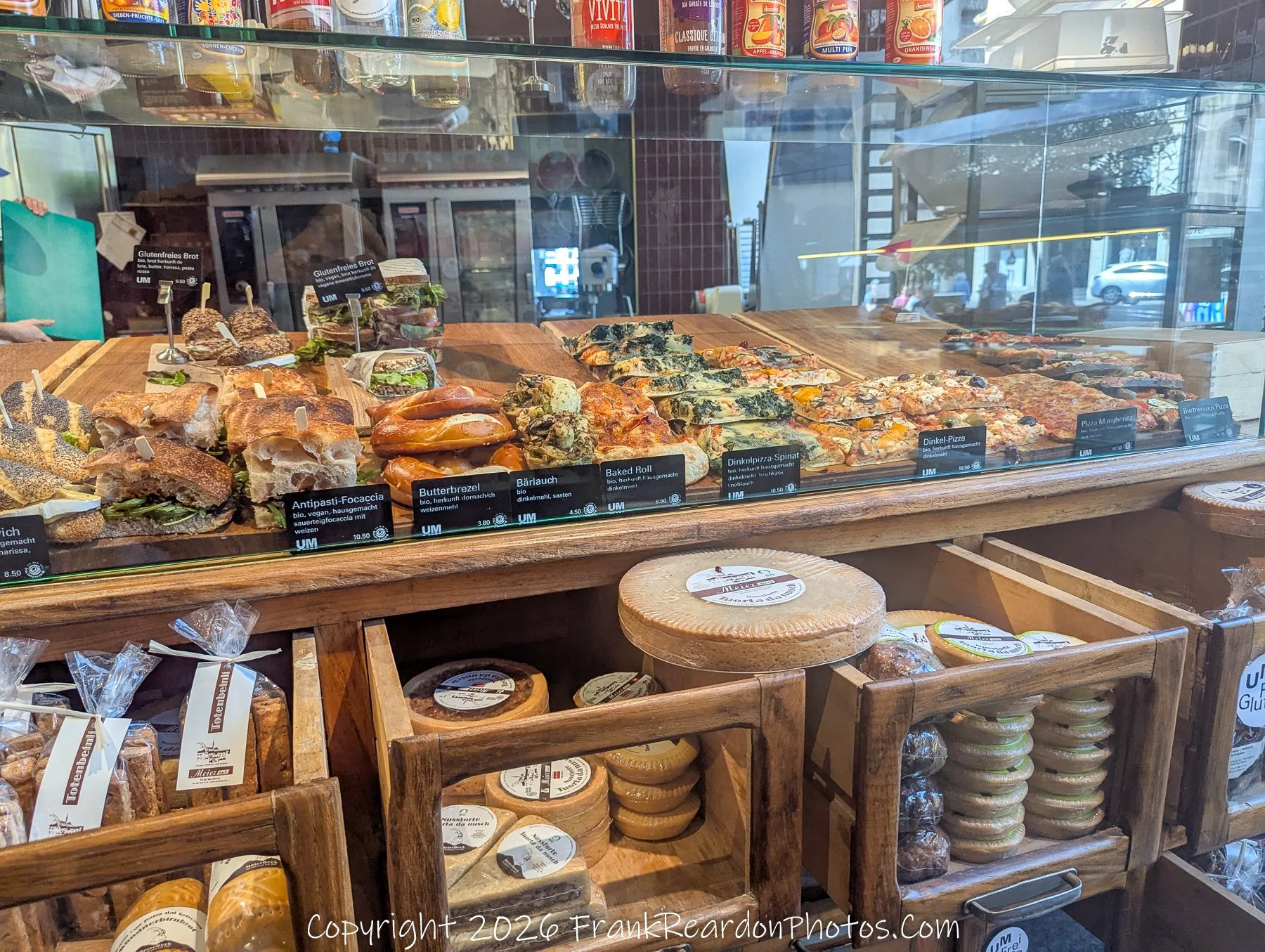 “Artisan Abundance” A bakery counter becomes a mosaic of textures and flavors, each loaf a crafted story.