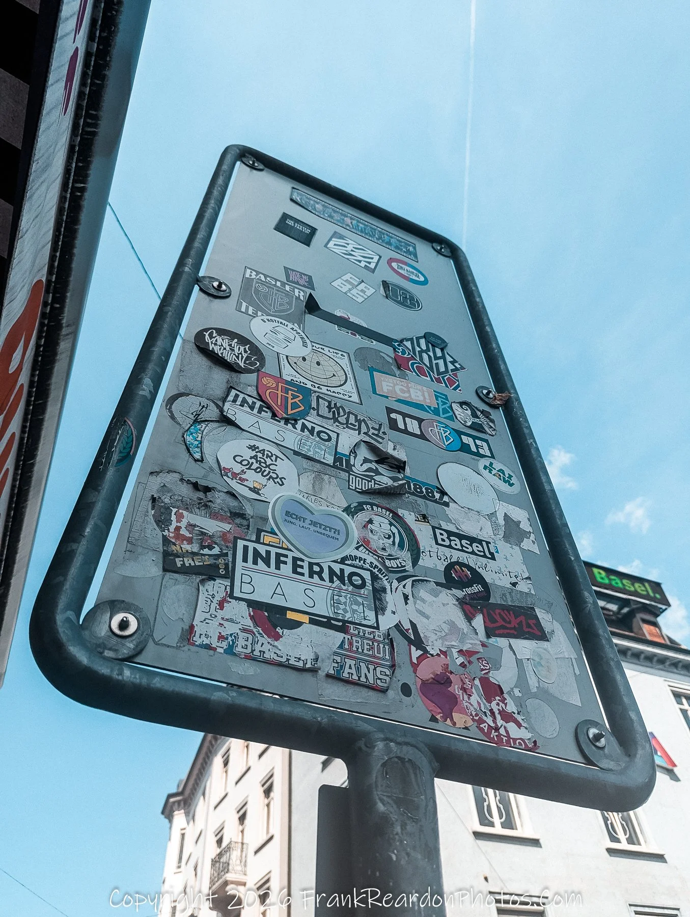 “Urban Collage” Stickers and symbols layer stories of Basel’s identity, rebellion, and pride.