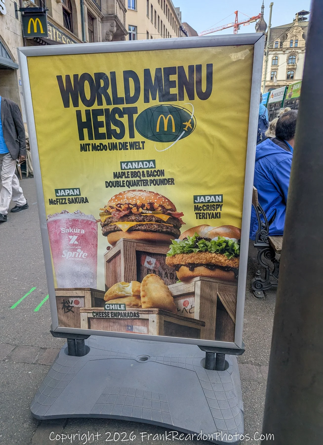 “Global Appetite” A McDonald’s poster turns fast food into a passport of flavors from Japan to Chile.