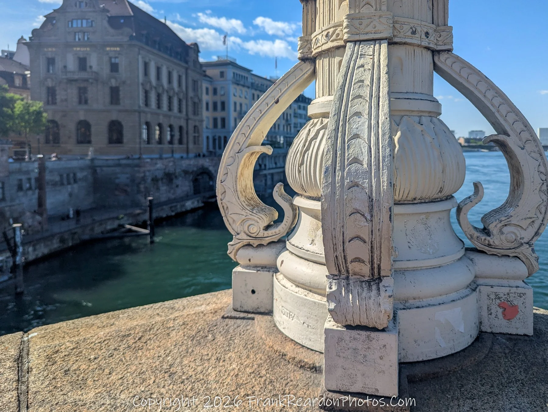 “Stone and Flow” Ornate craftsmanship meets the steady pulse of the Rhine, a dialogue between permanence and movement.