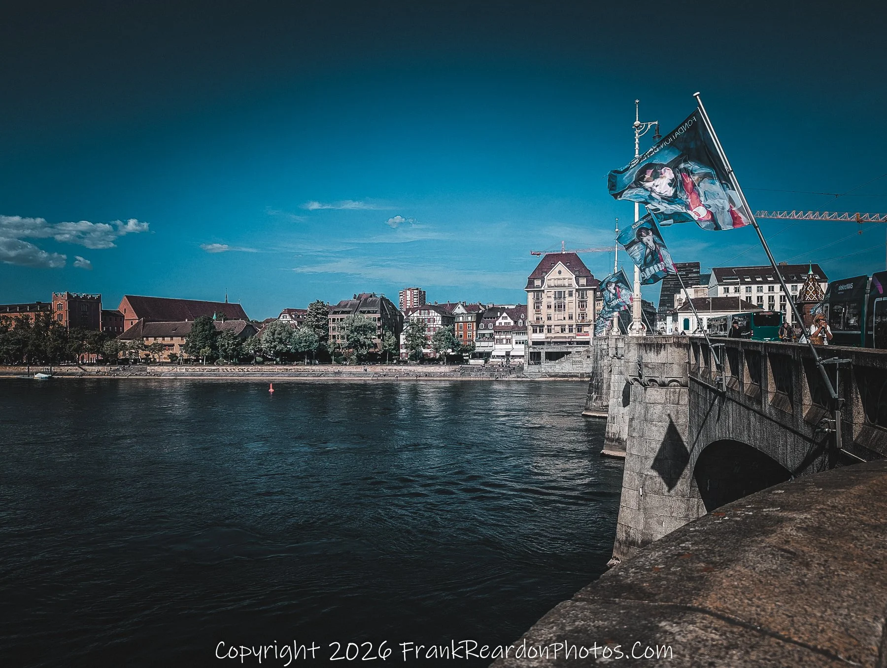 “Flags of the Rhine” Color and motion dance above the river, where art meets the current of daily life.