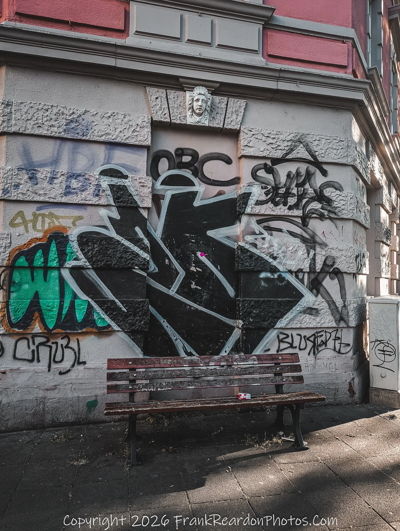 Empty Bench and Street Art.
Solitary Seat
