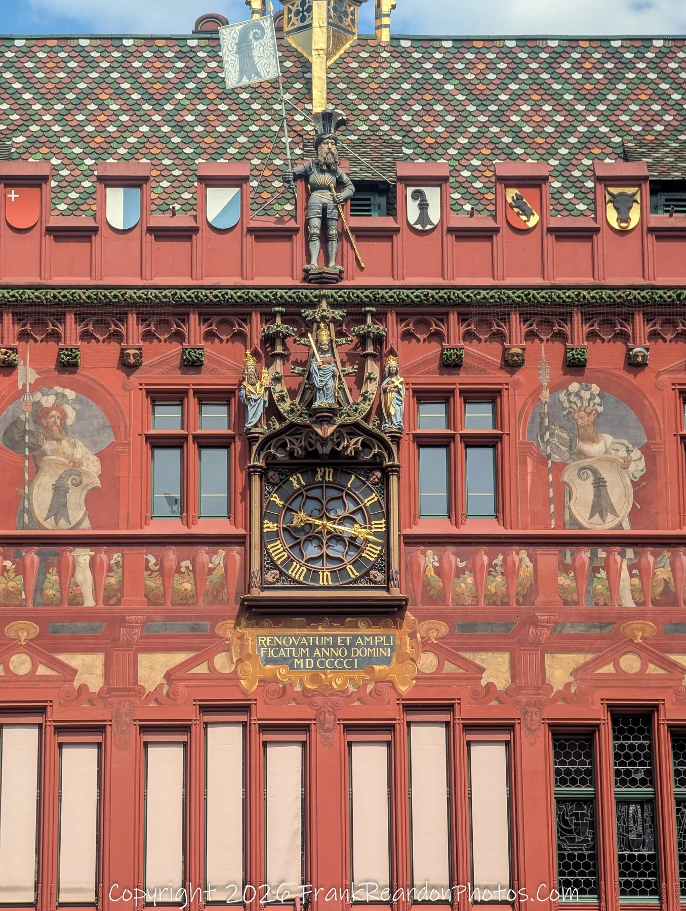“Heralds of Basel” Painted figures and shields watch over the city’s civic pride from the Rathaus façade.