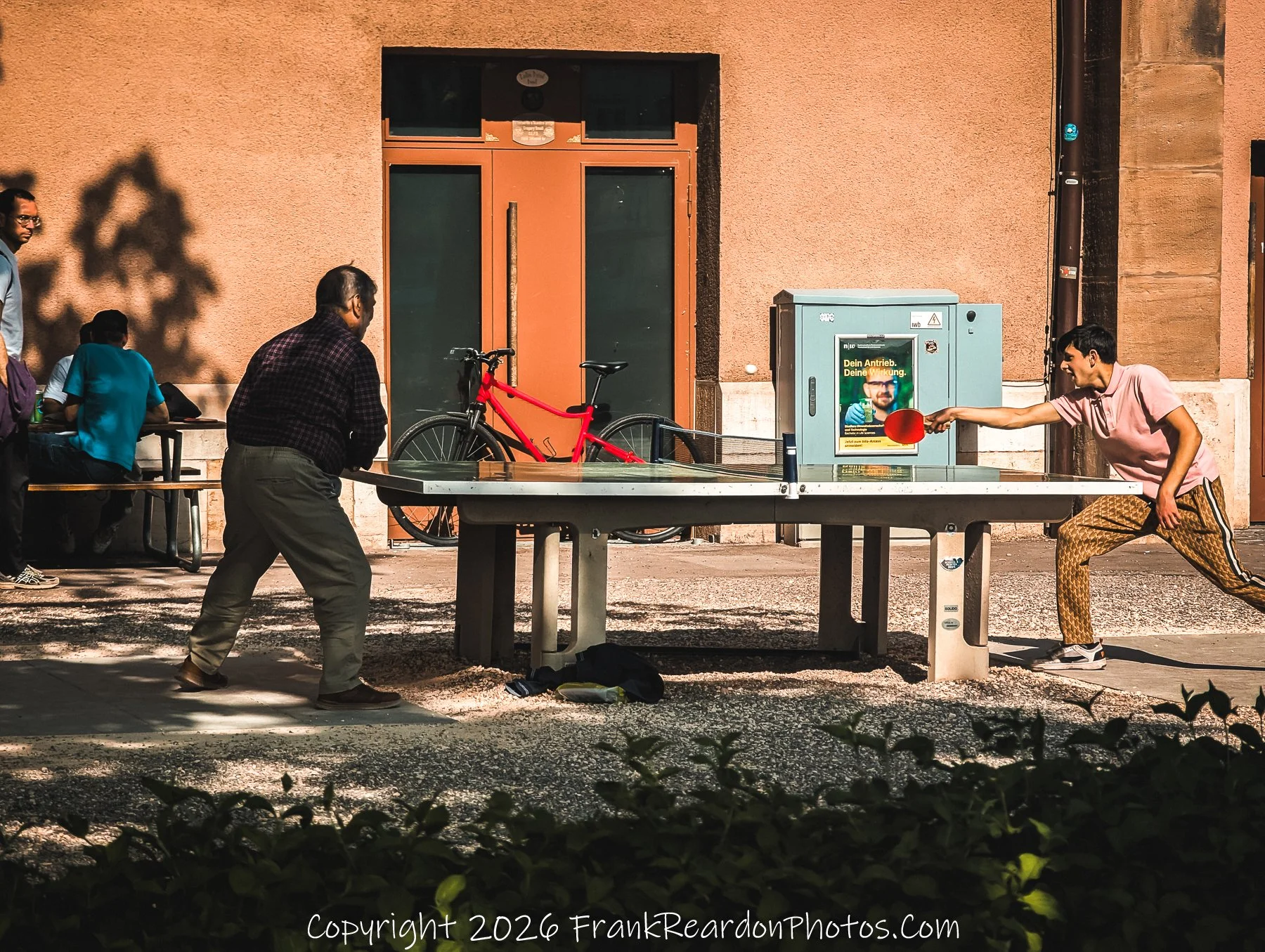 “Ping Pong Dialogues” A courtyard duel of laughter and focus, Basel’s everyday choreography of play and connection.