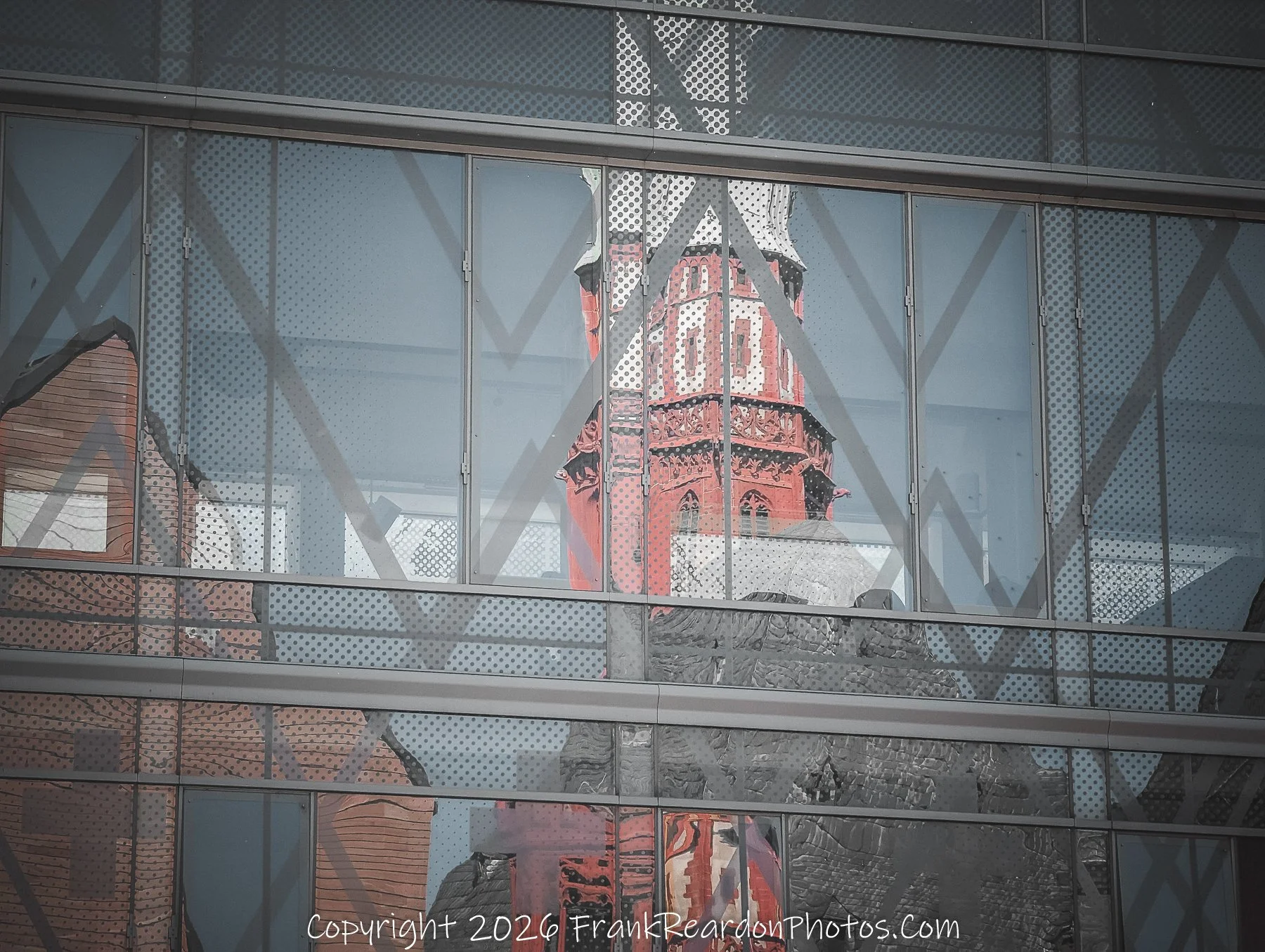 Reflected Church Tower Through Glass Architecture
“Reflections of Heritage – Frankfurt Layers”