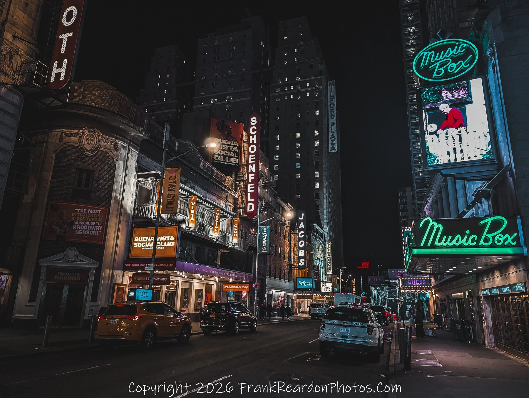 “Theater District Glow: Signs and Stories”