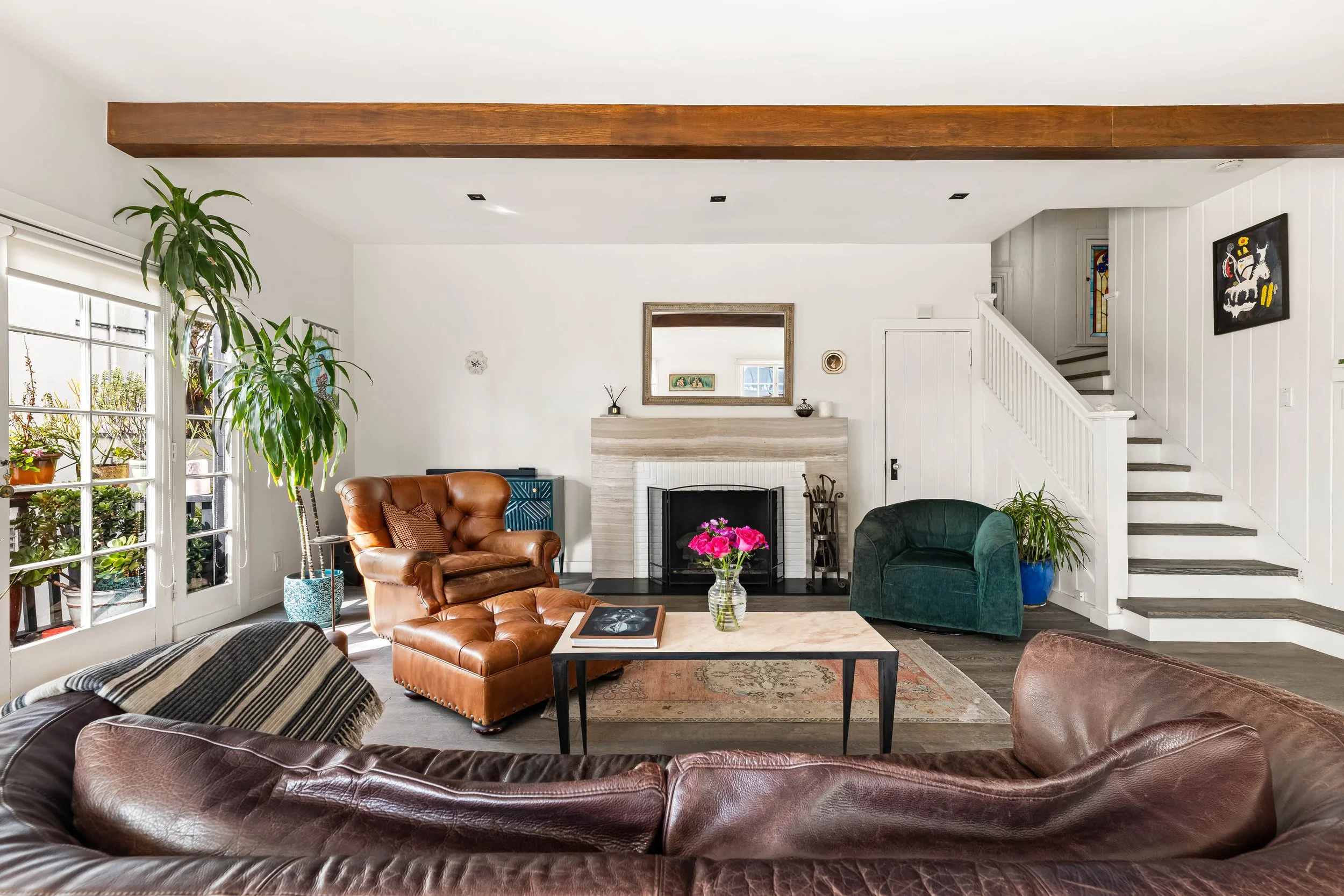 1767-n-orange-grove-ave-27-living-room-open-to-stairs-hollywood-hills-los-angeles.jpg