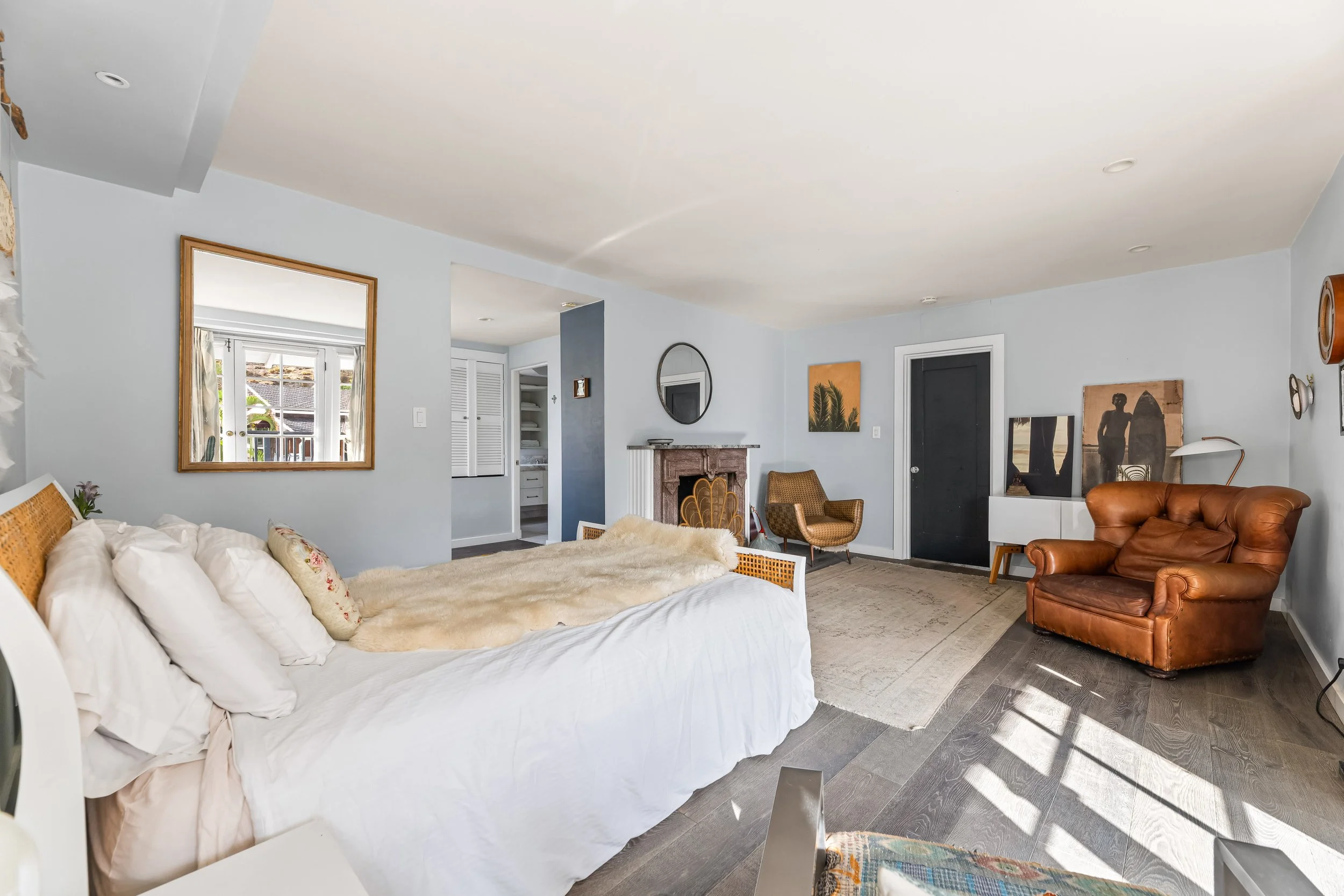 1767-n-orange-grove-ave-11-primary-bedroom-fireplace-sitting-area-hollywood-hills-los-angeles.jpg
