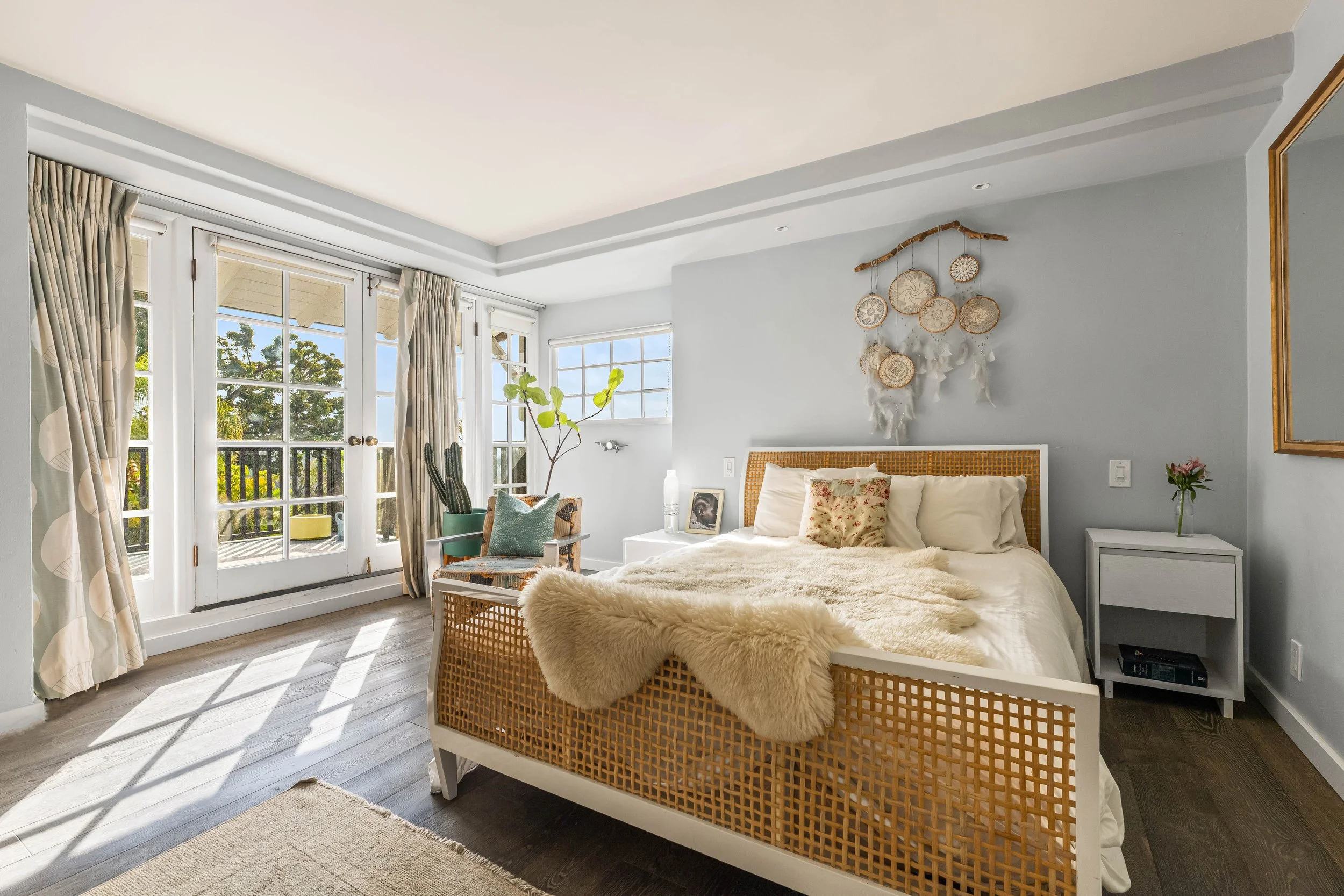 1767-n-orange-grove-ave-10-primary-bedroom-french-doors-balcony-hollywood-hills-los-angeles.jpg