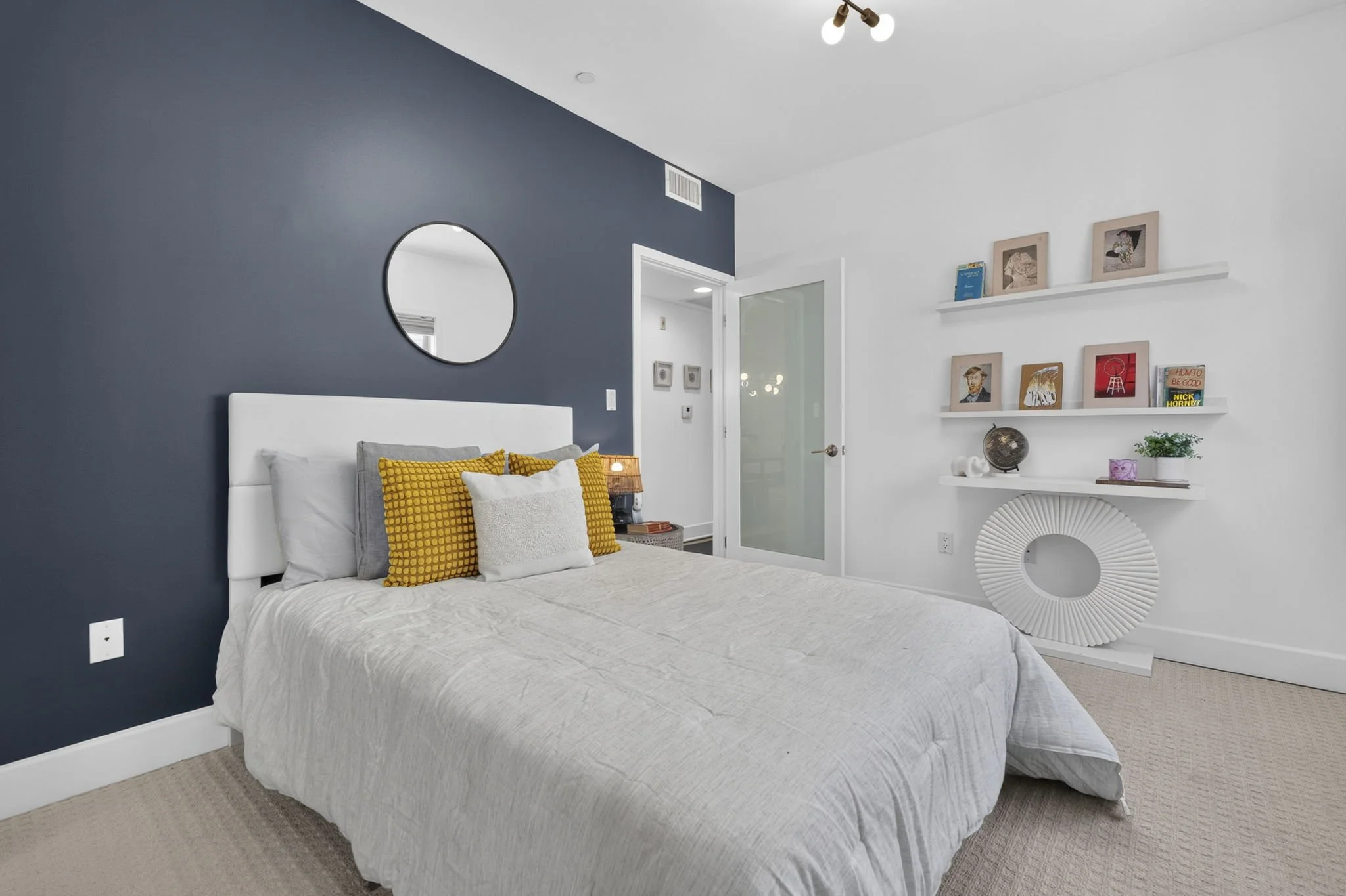 125-s-sweetzer-ph2a-12-bedroom-navy-accent-wall-los-angeles.jpg