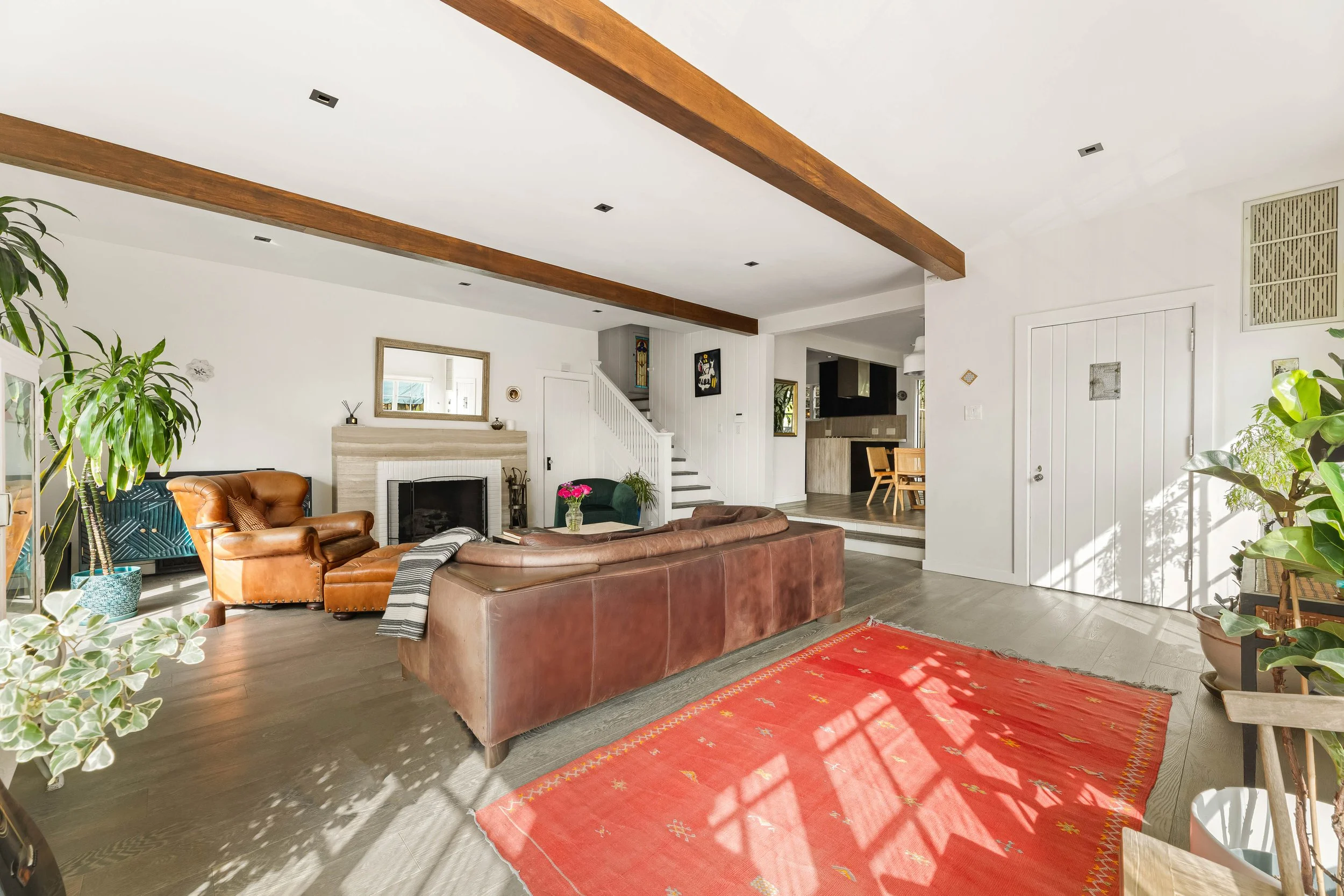 1767-n-orange-grove-ave-29-living-room-fireplace-open-plan-hollywood-hills-los-angeles.jpg