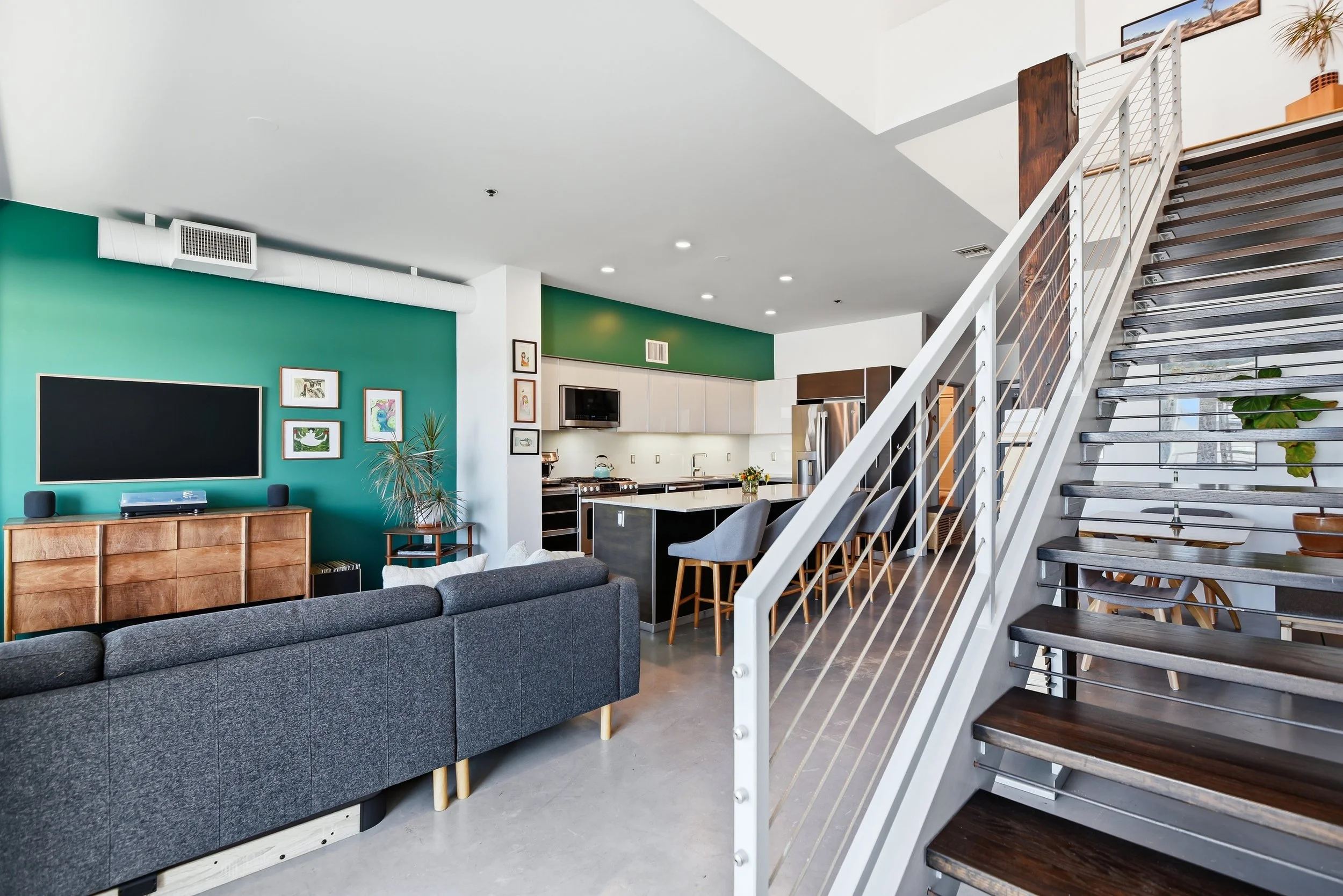 Spacious open living area inside the loft at 11500 Tennessee Ave #324 in West Los Angeles, offering modern design and natural light near the Sawtelle district.