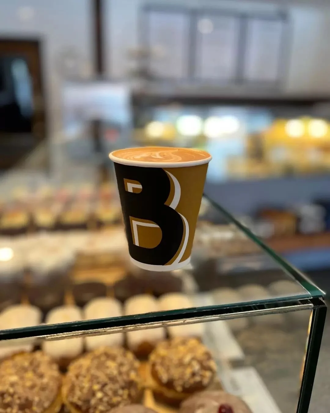 We love coffee so much so that we branded our cups so you can think of us each time you take a sip! Oh, and if you scan the QR code on the cup you can order delivery online... you're welcome! 📦